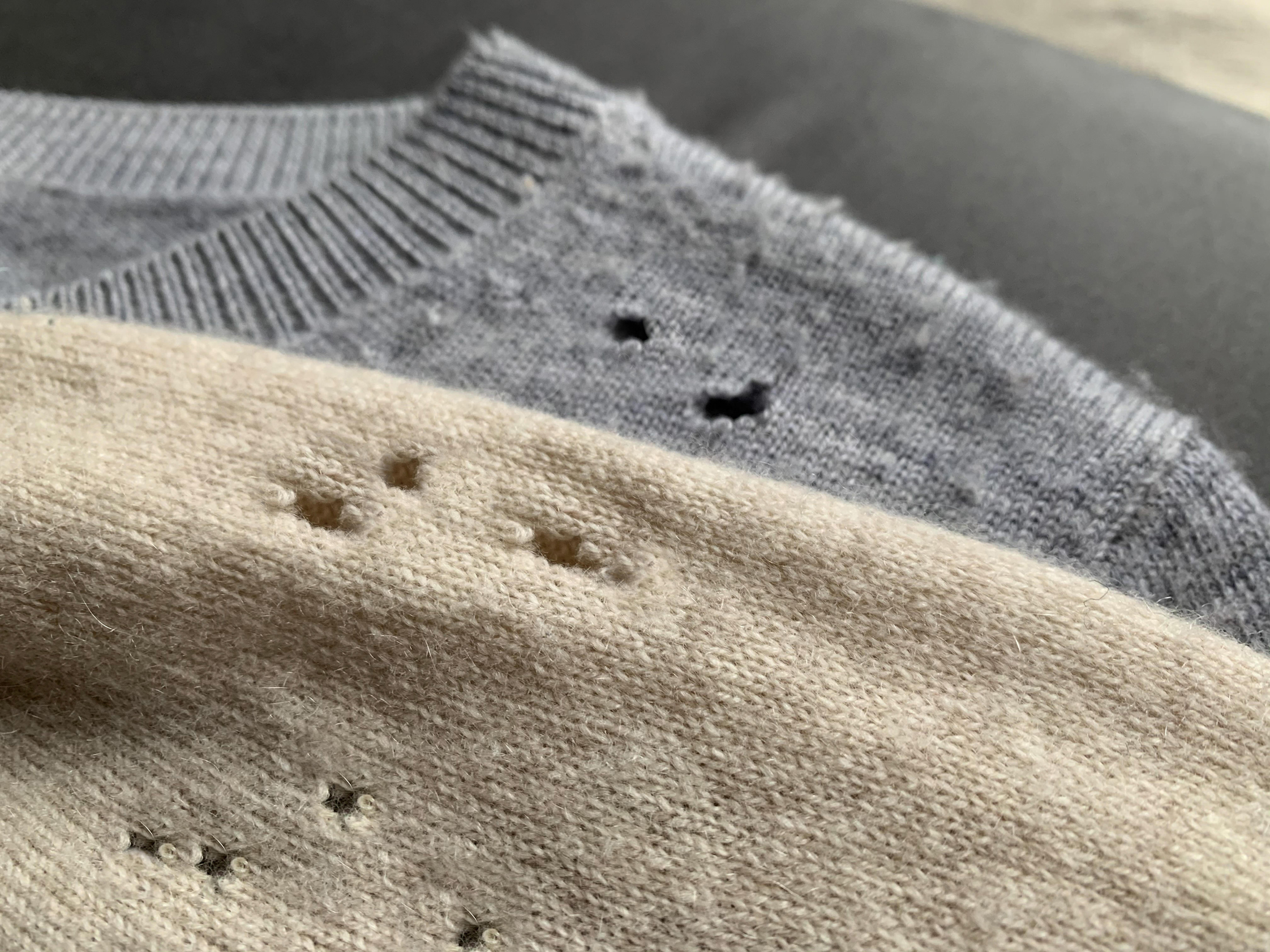 Cashmere sweaters with moth holes