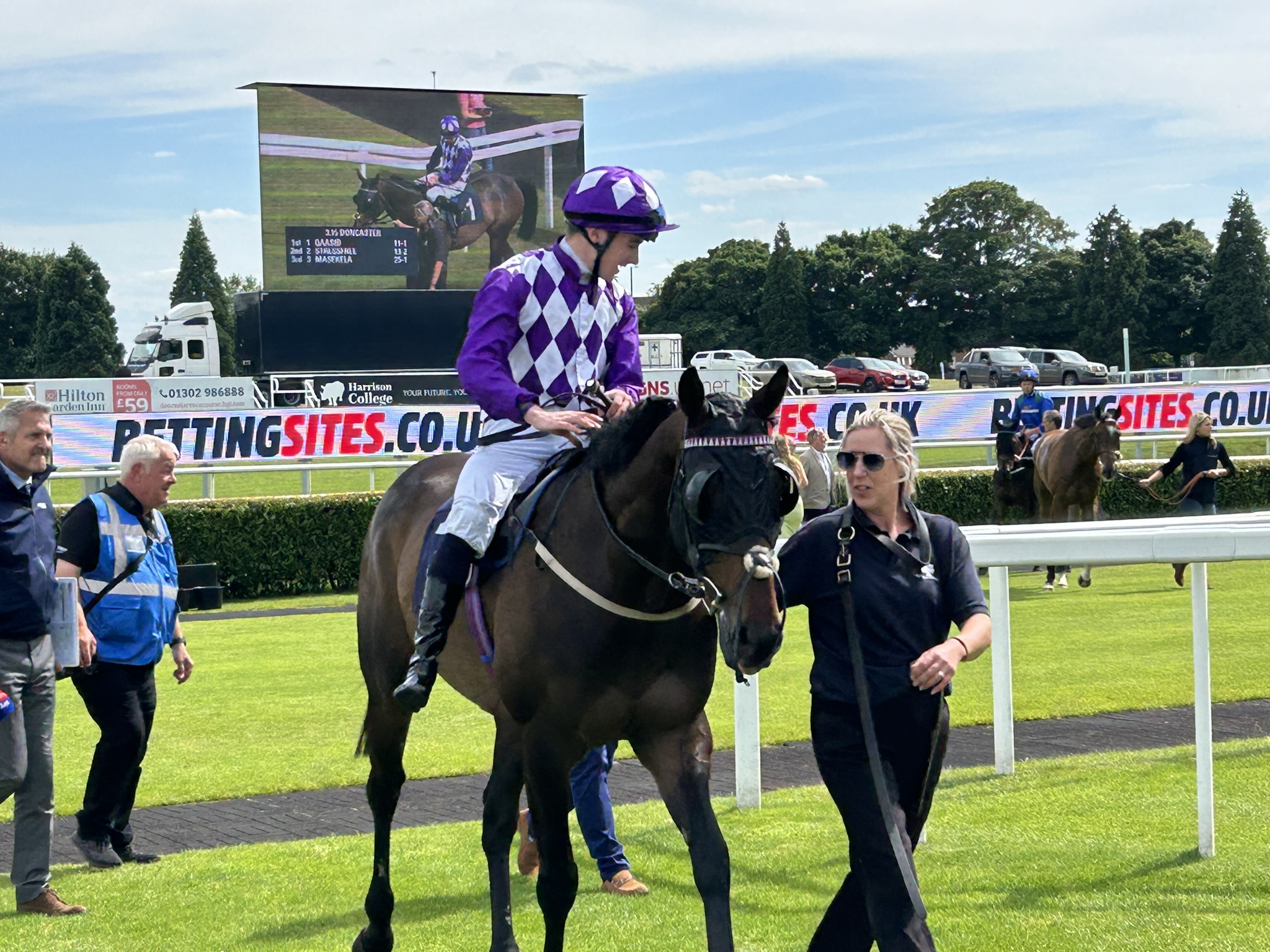 Qaasid comes into the winning enclosure