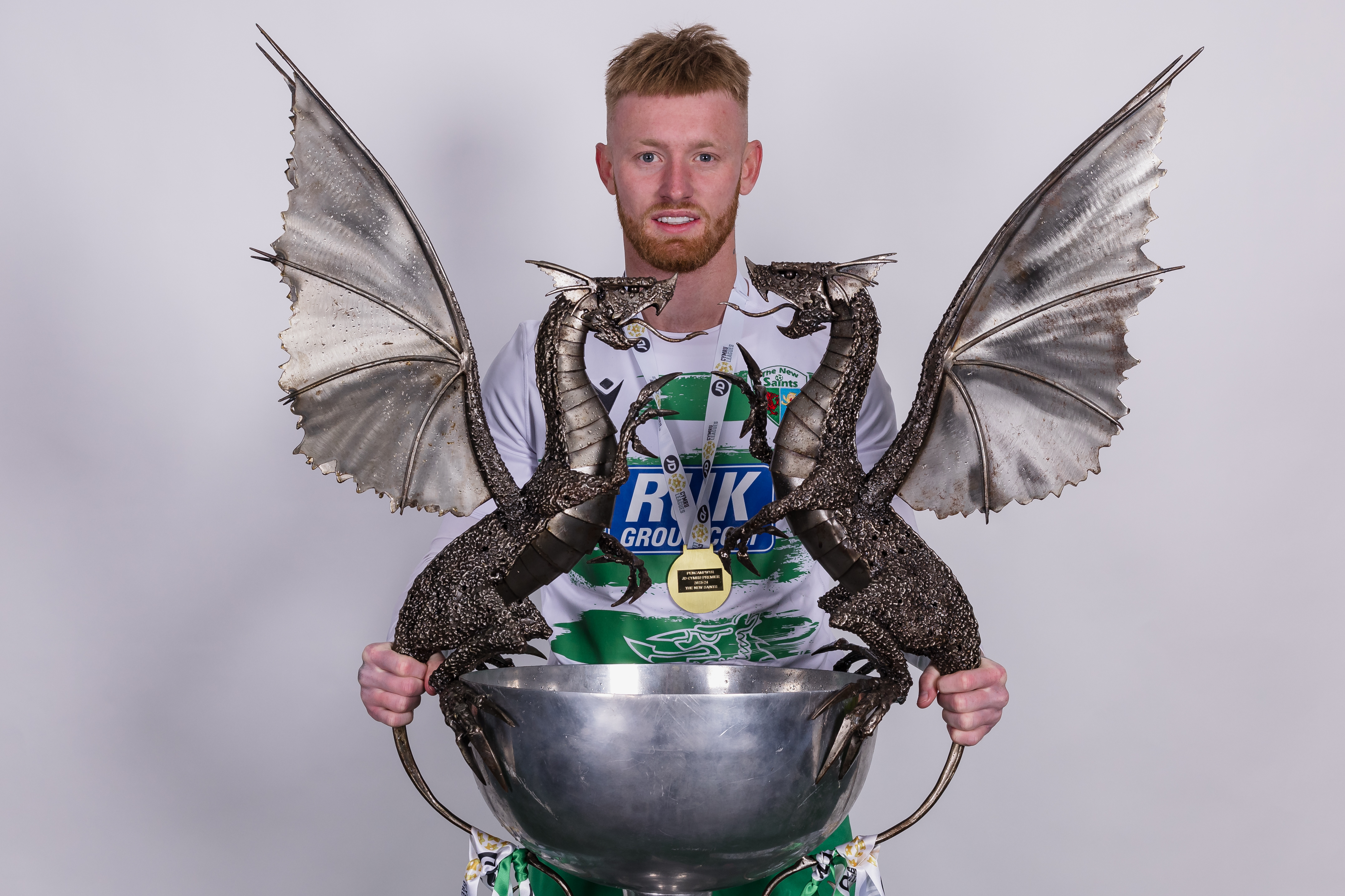 Brad Young with the Welsh Premier trophy