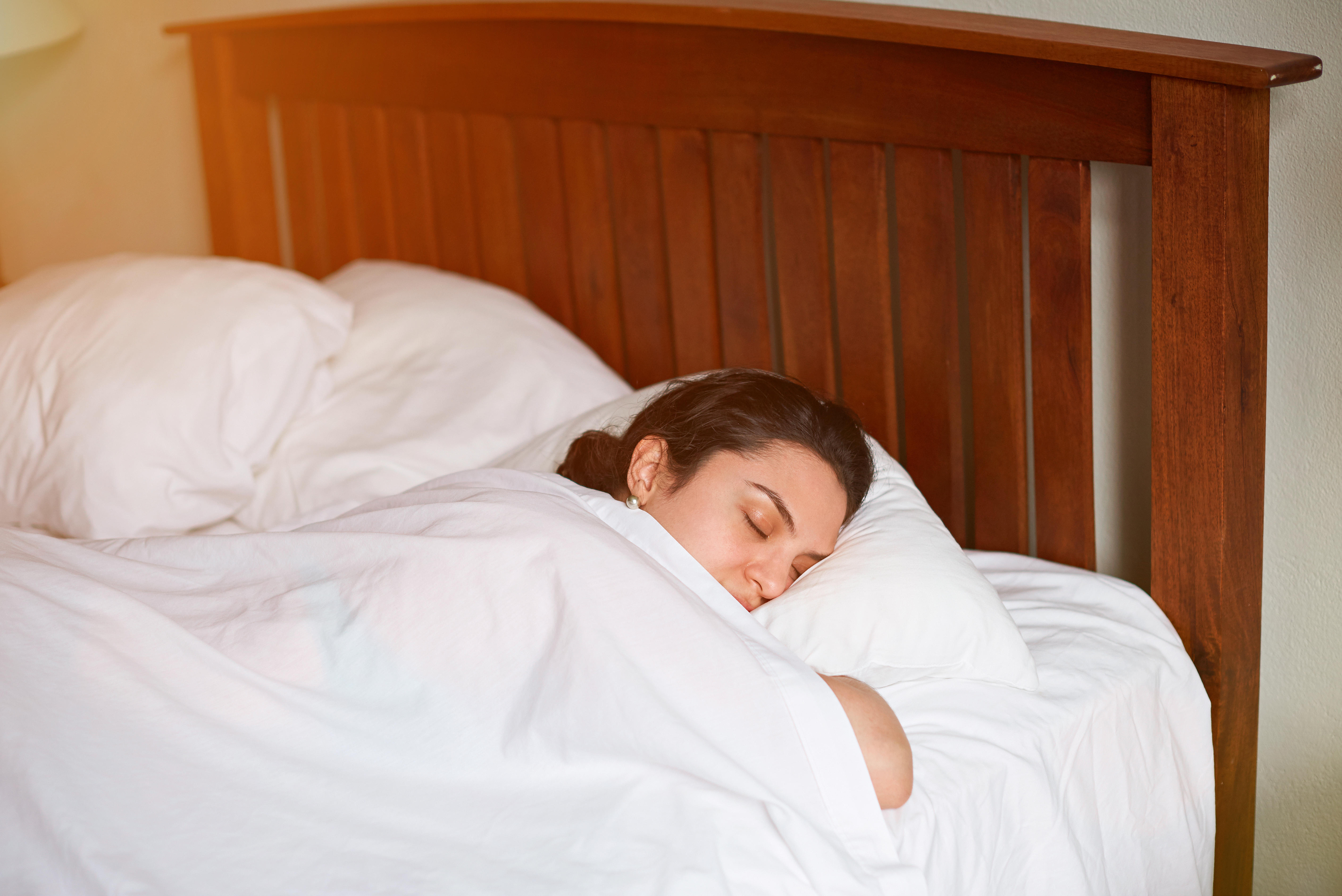 A woman sleeping in bed