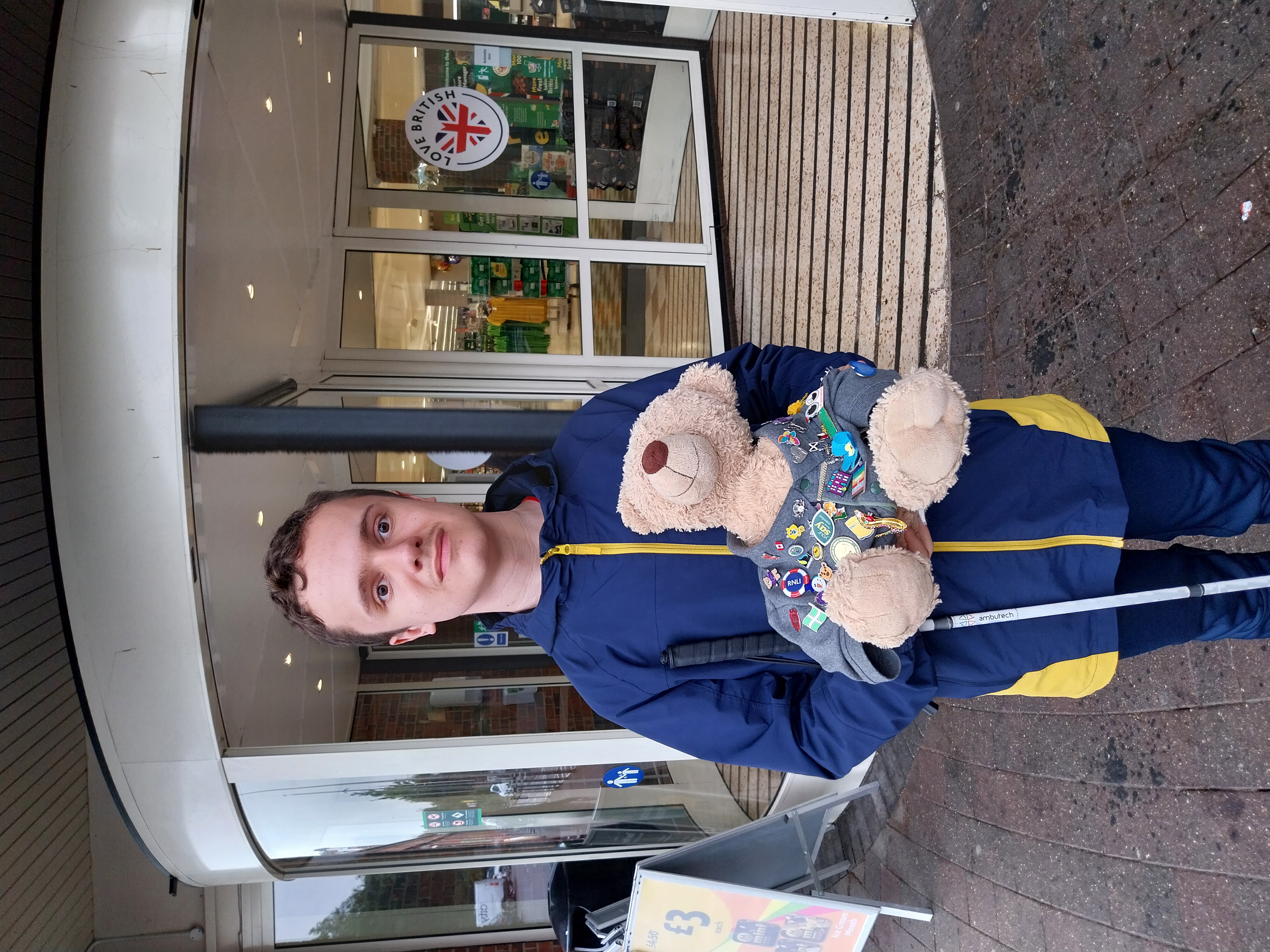 Boy holding teddy