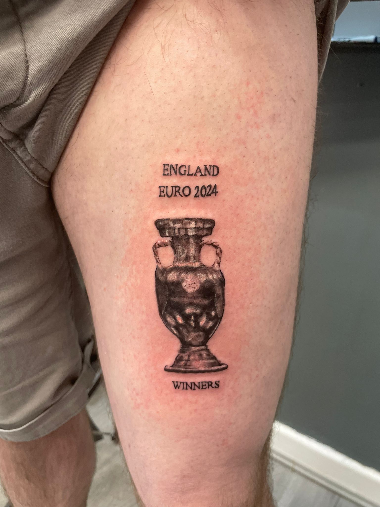 Tattoo of the Euros trophy with the words 'England Euro 2024 Winners'