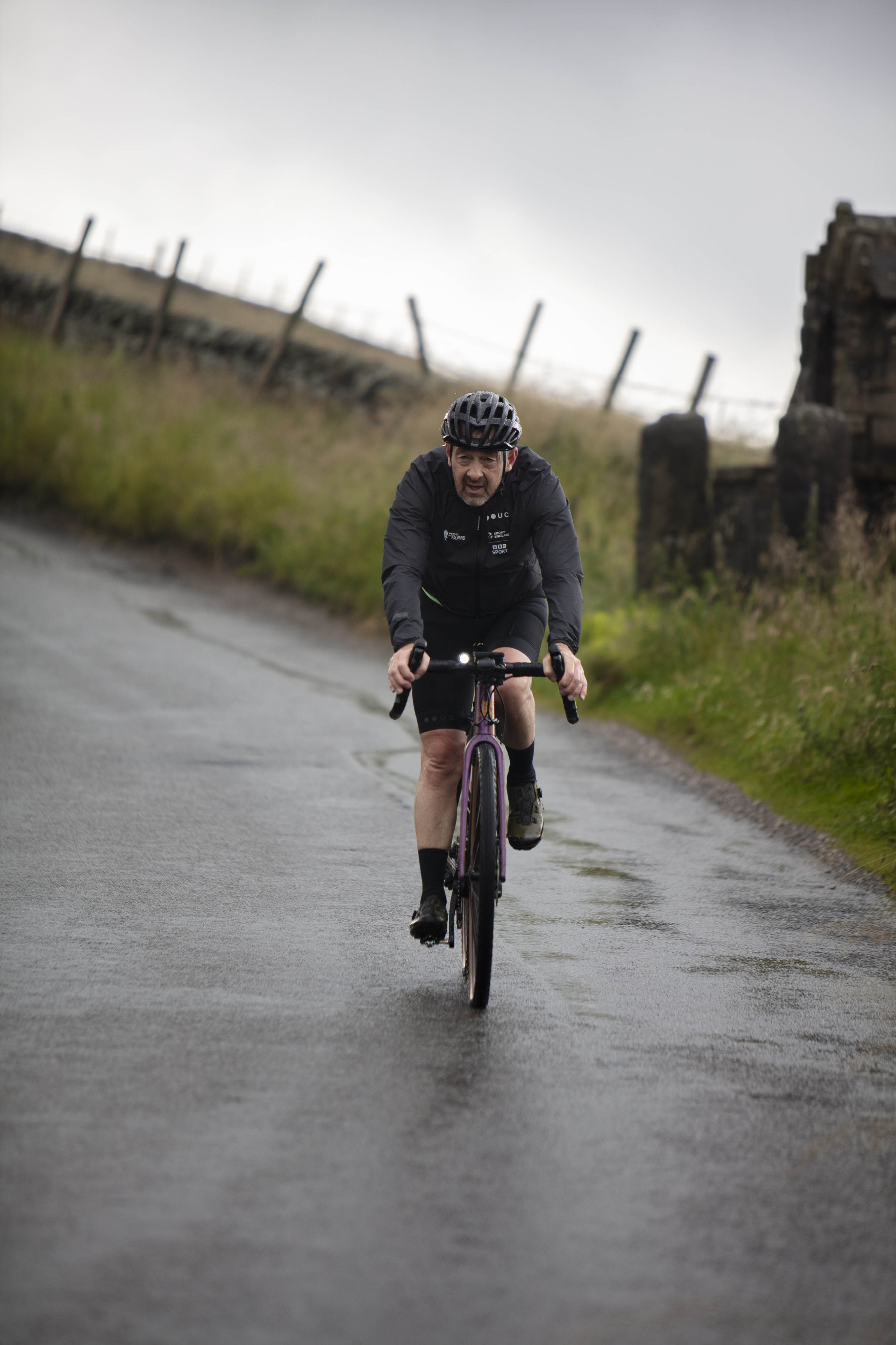 Man cycling on road 