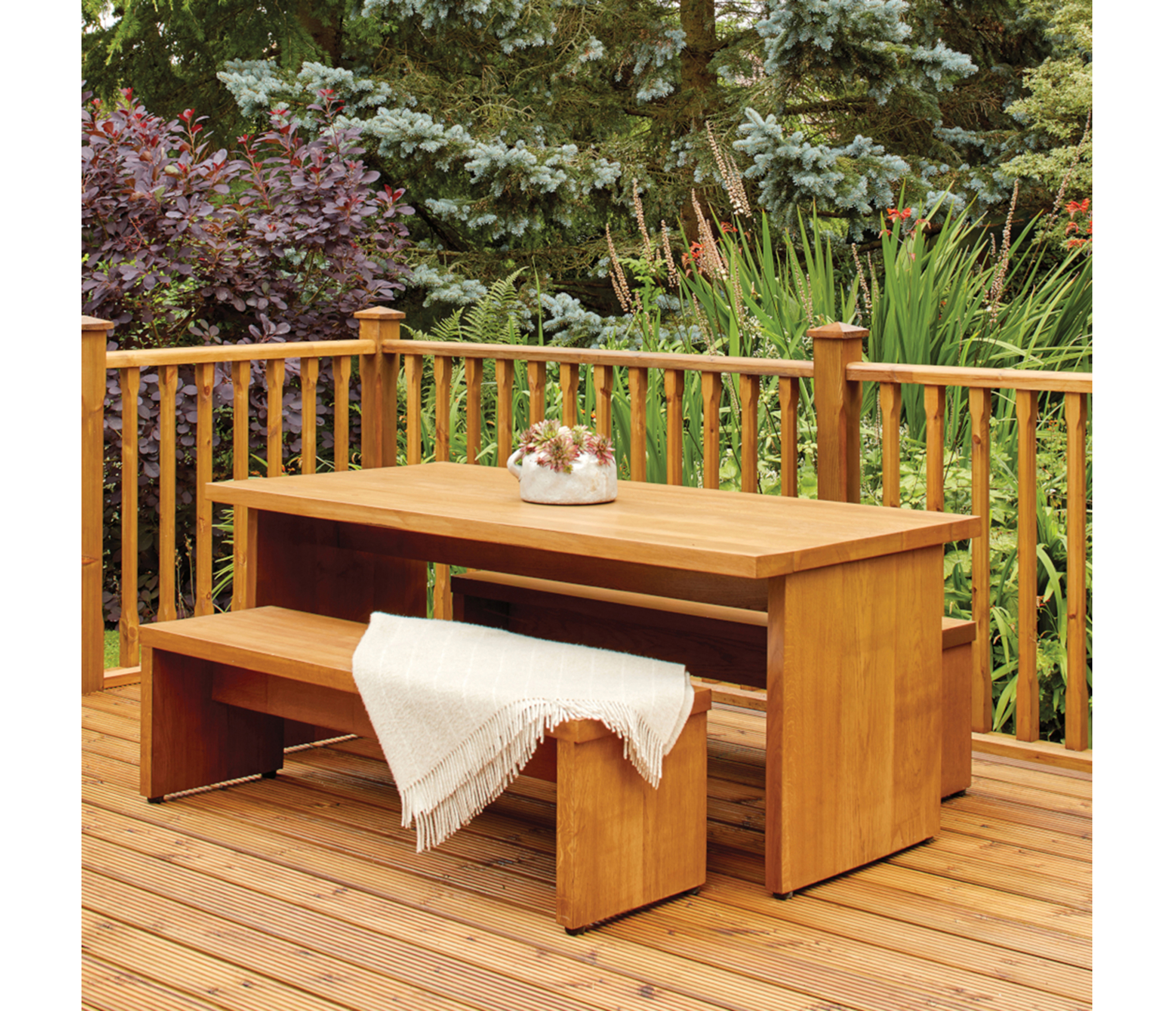 Wooden garden furniture in outdoor setting