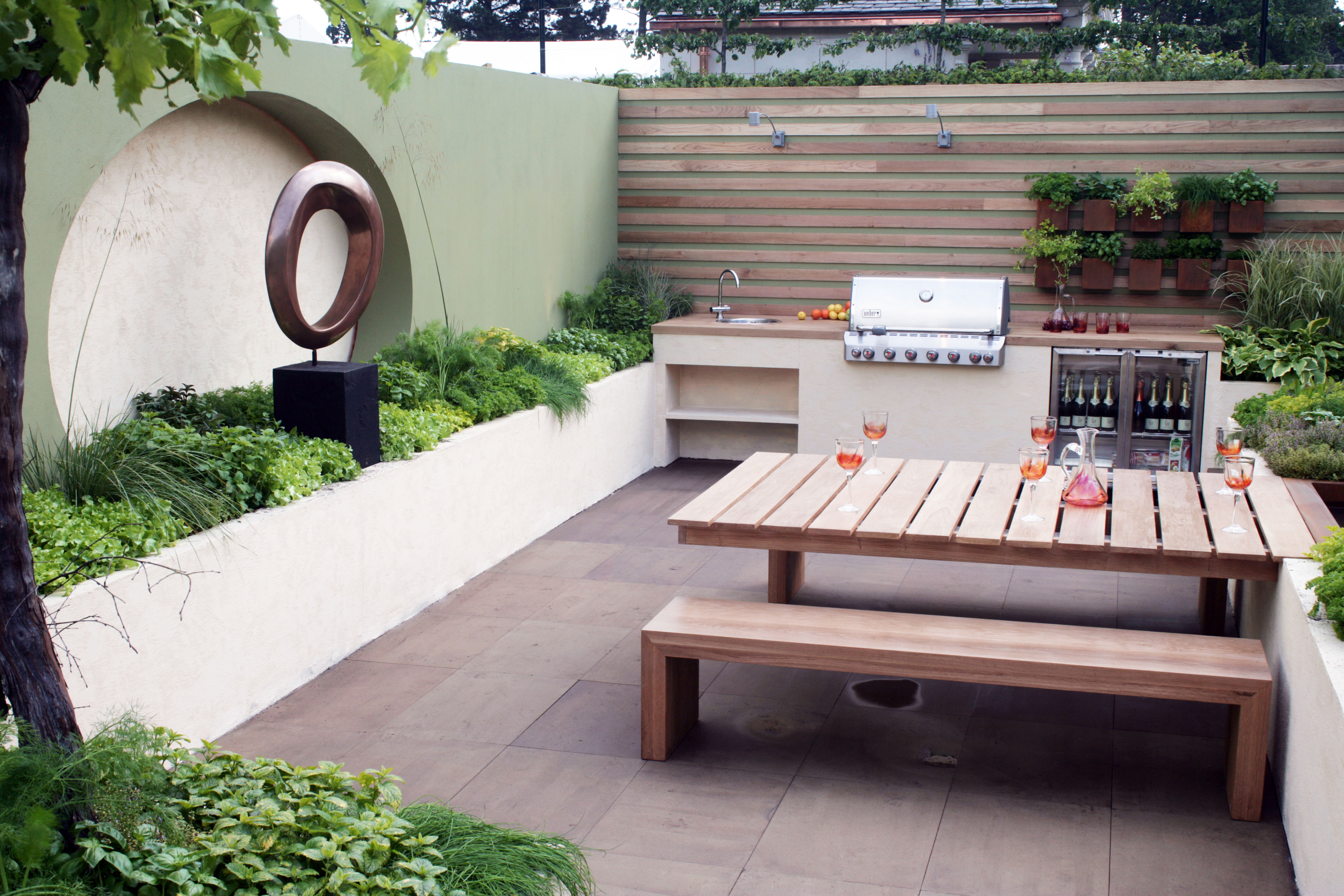 Outdoor kitchen with BBQ and outdoor wine cooler