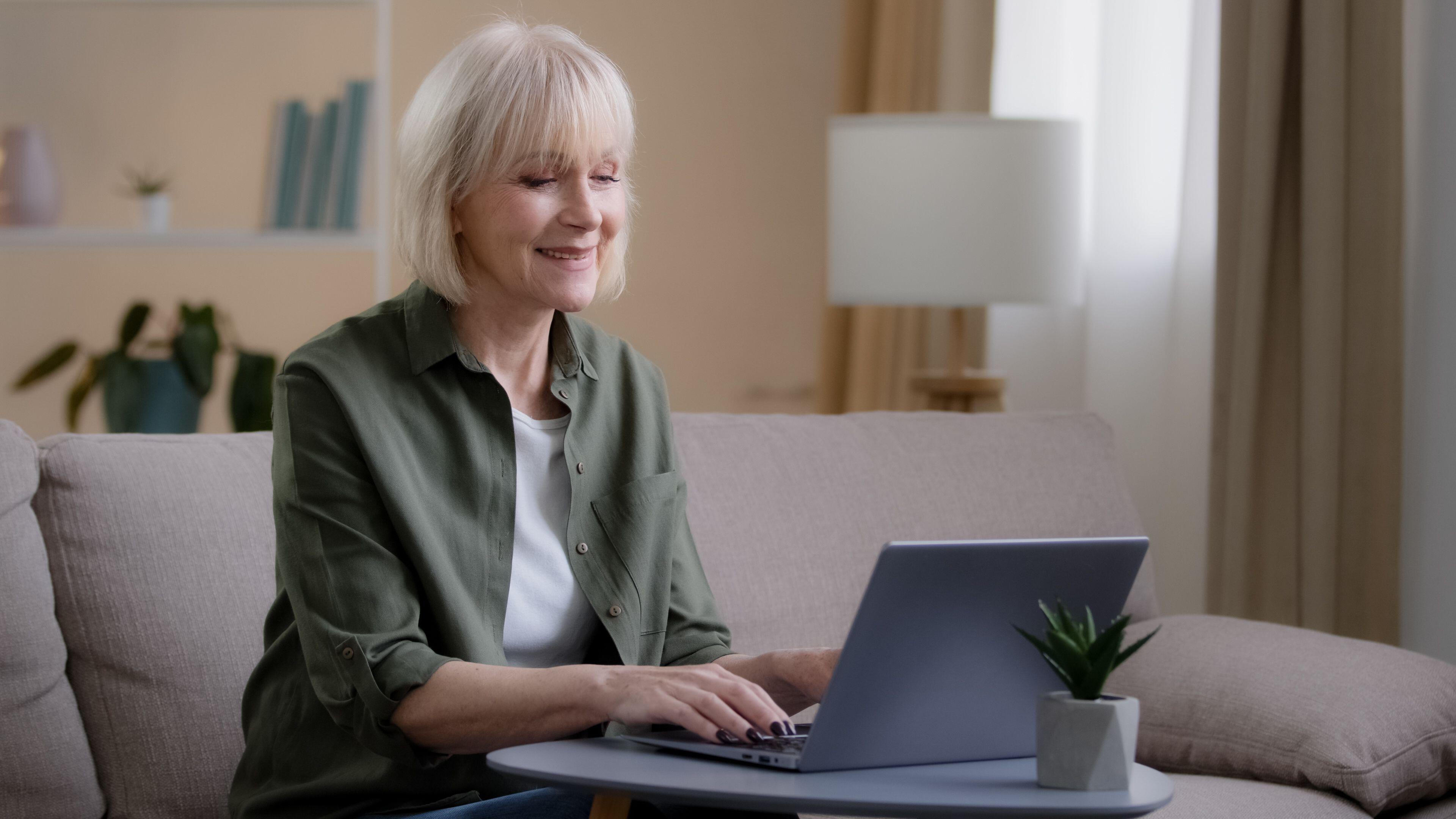 woman at home on her laptop