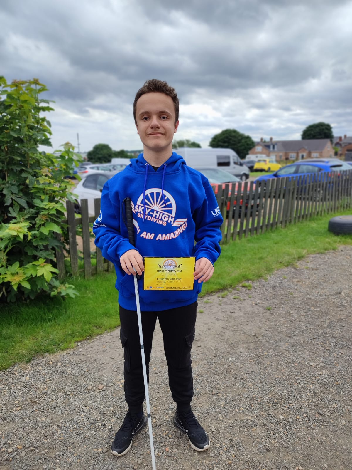 Boy holding a certificate 