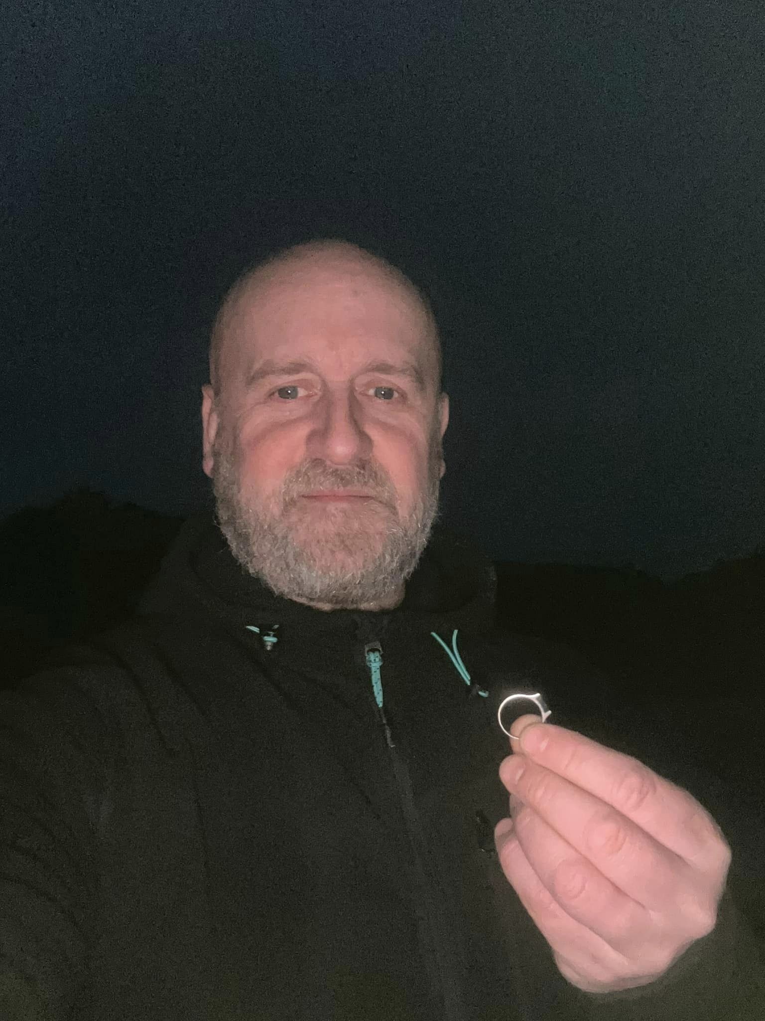 Man posing with ring 