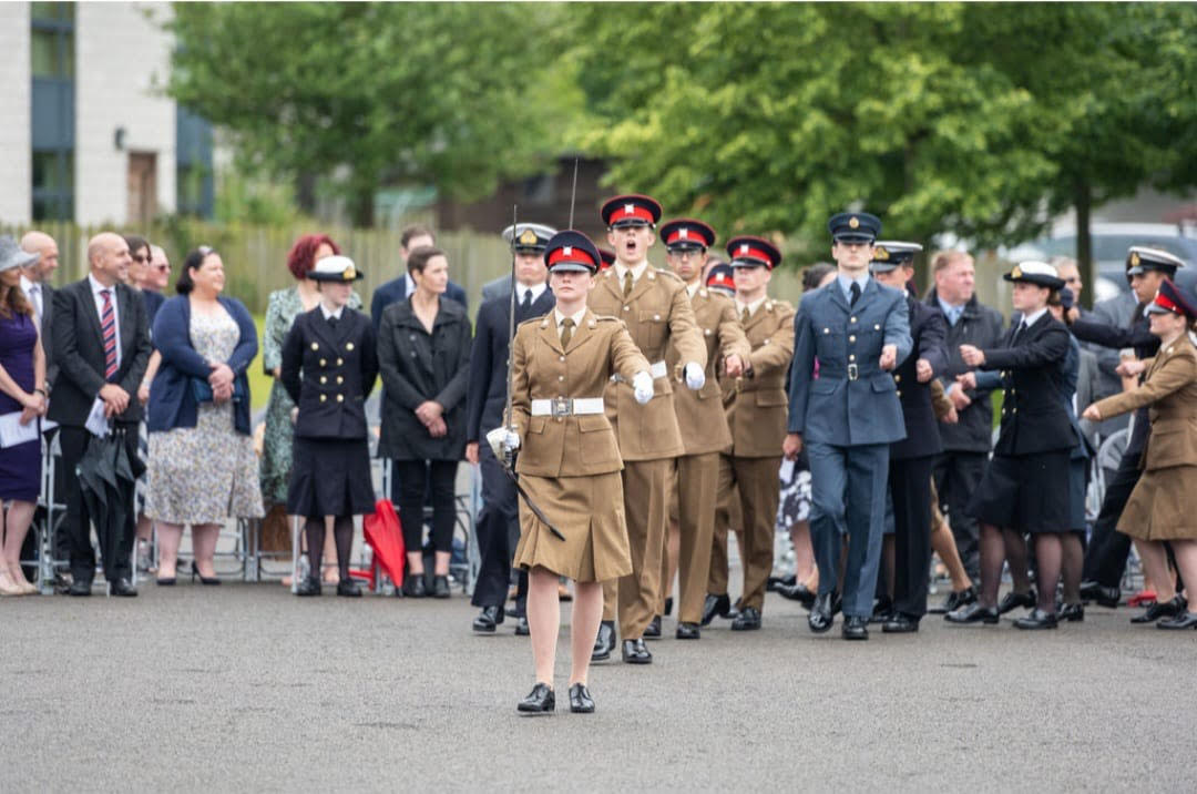 Military personnel marching