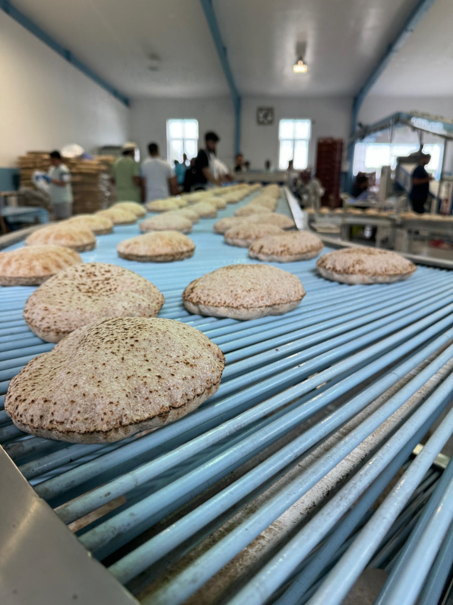 A view of a conveyor belt at the roti plant