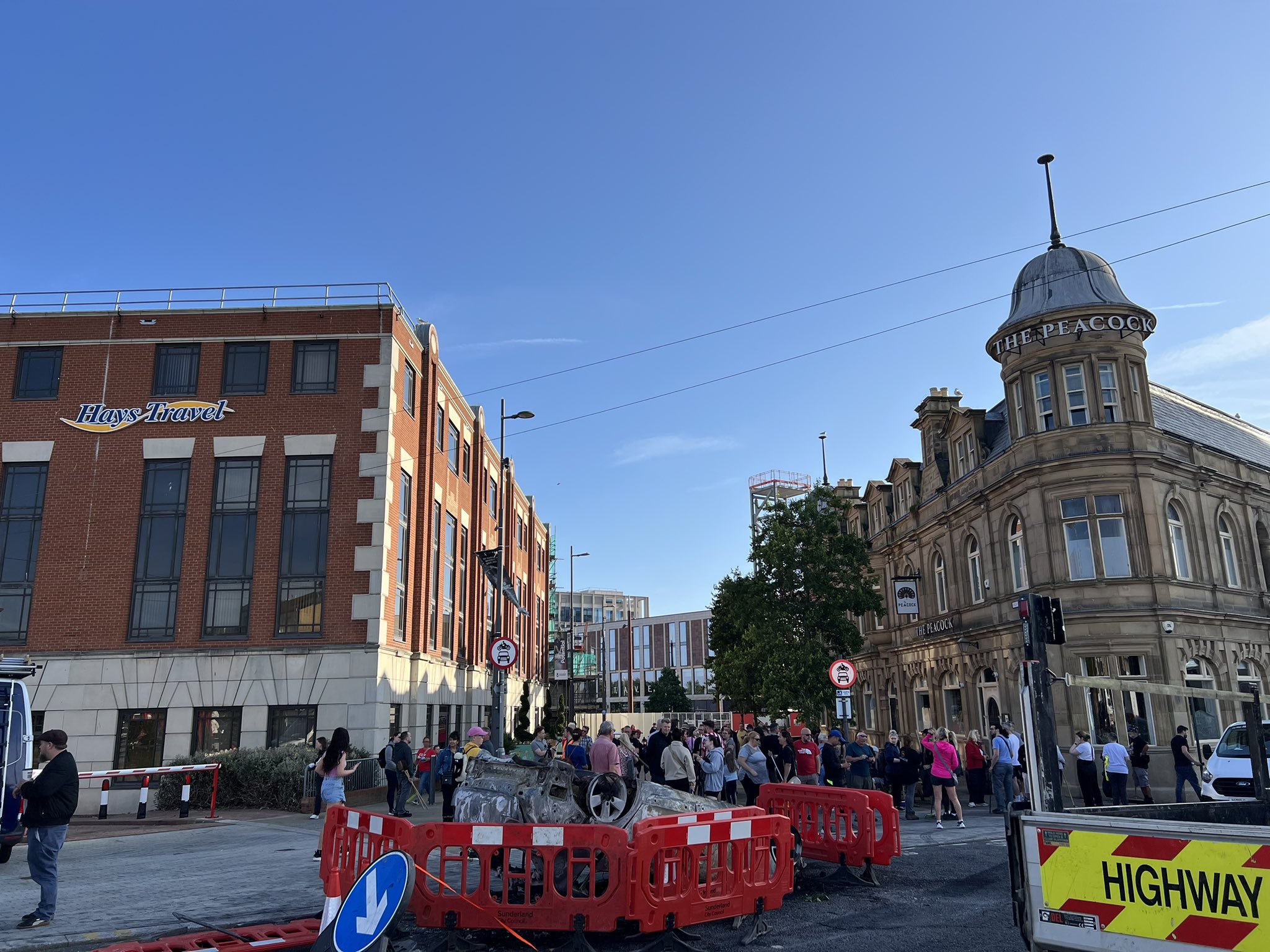 Wide shot of a street in Sunderland following a night of unrest