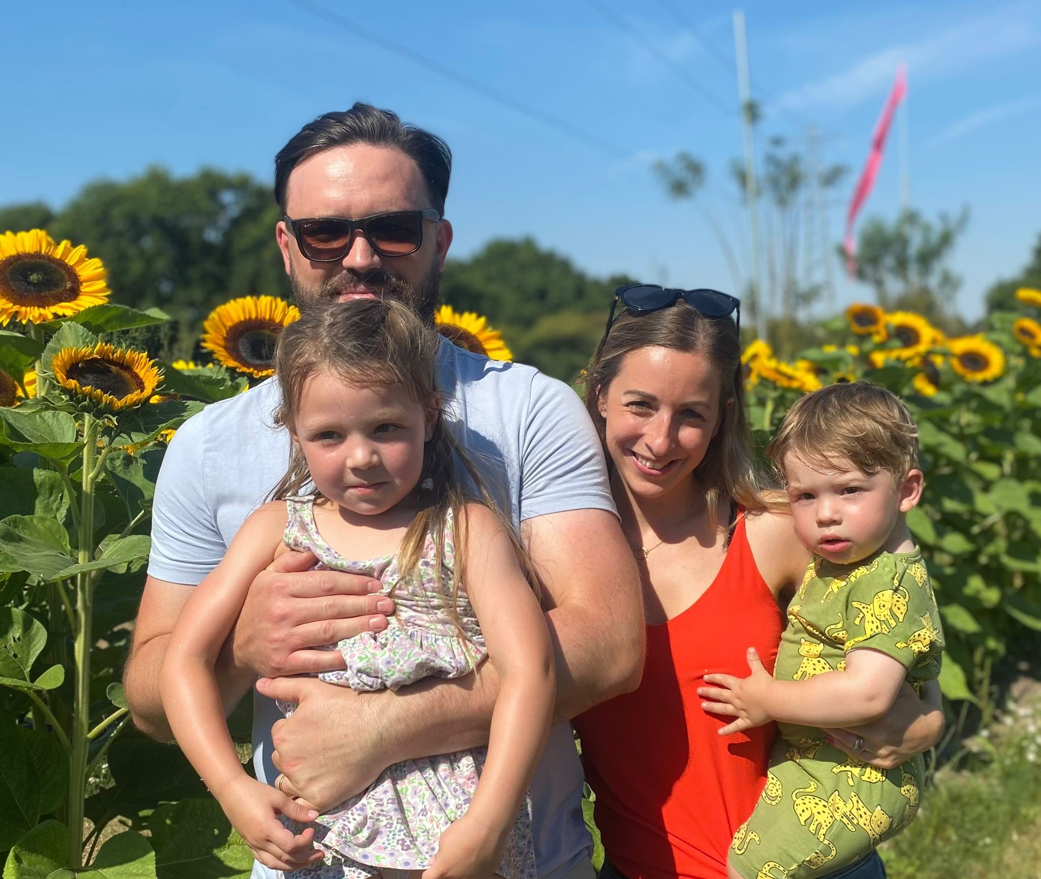 Christine Burlison (second right) with a man and her two children, Aria and Jude