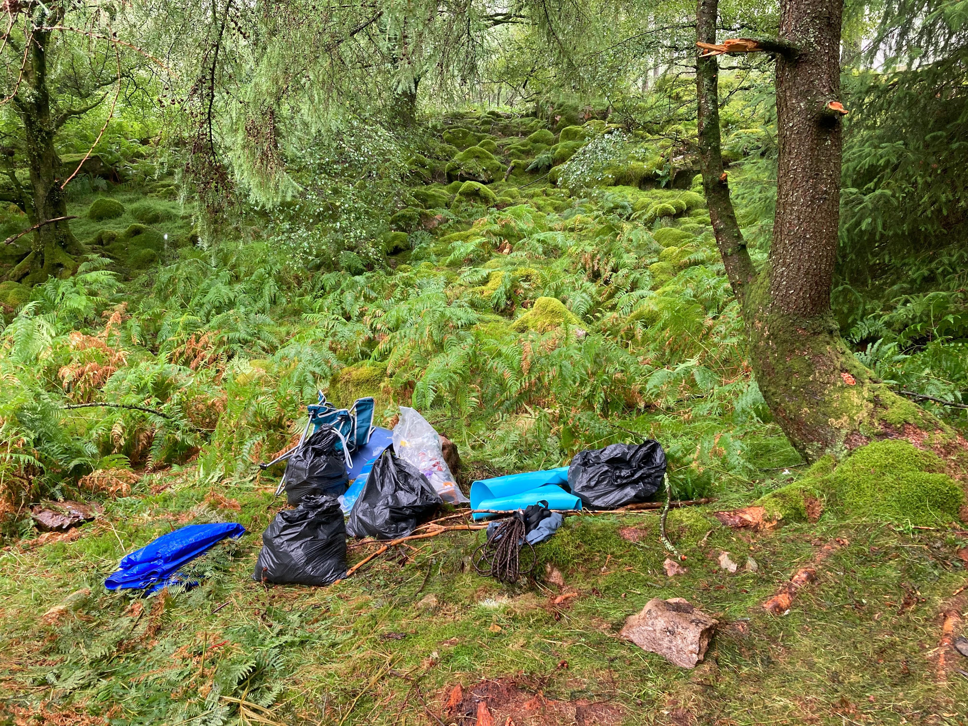 Cleaning up litter and equipment left by fly campers in the Lake District (National Trust/Miriam Wood)