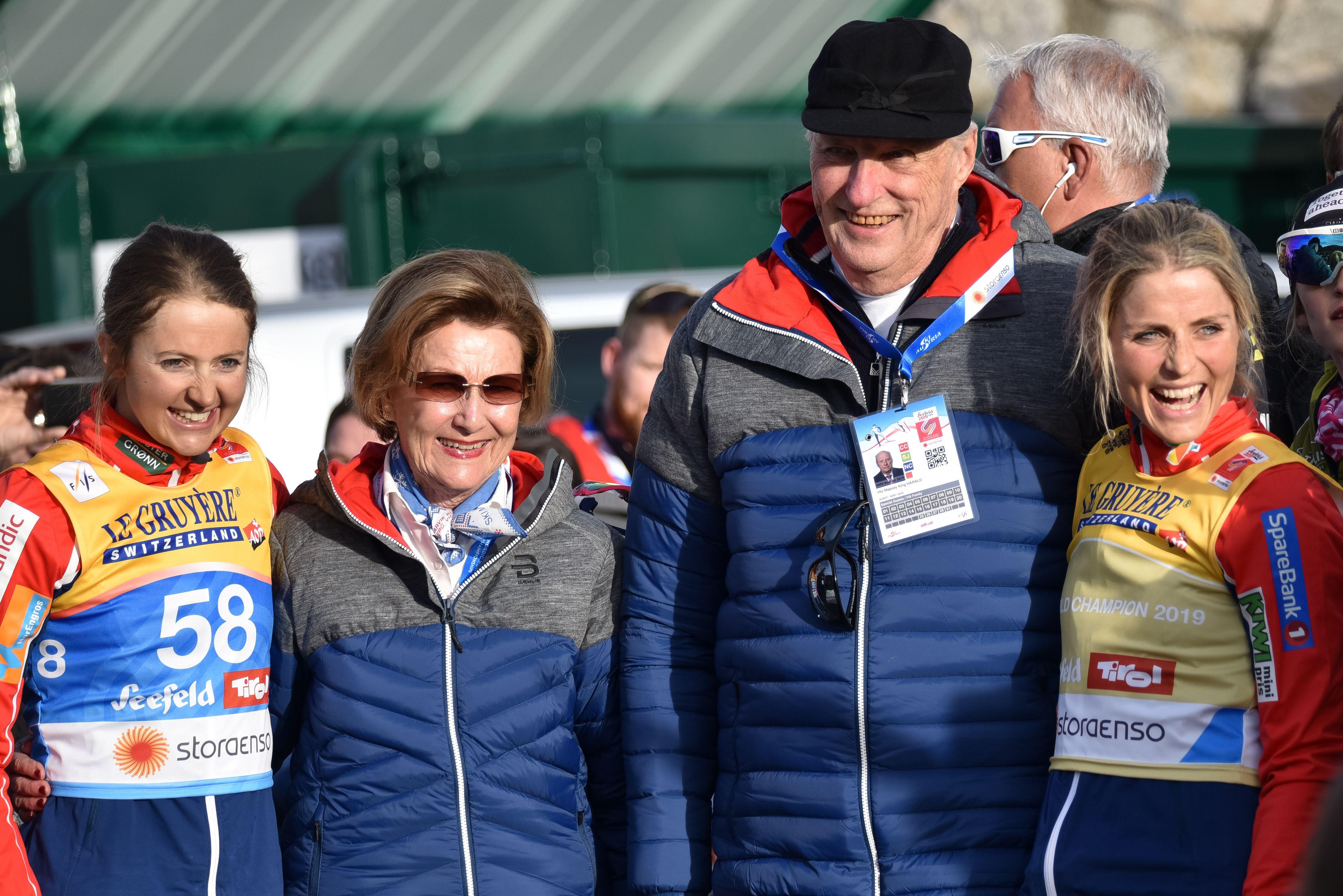 King Harald of Norway and Queen Sonja with Norwegian national ski team skiers