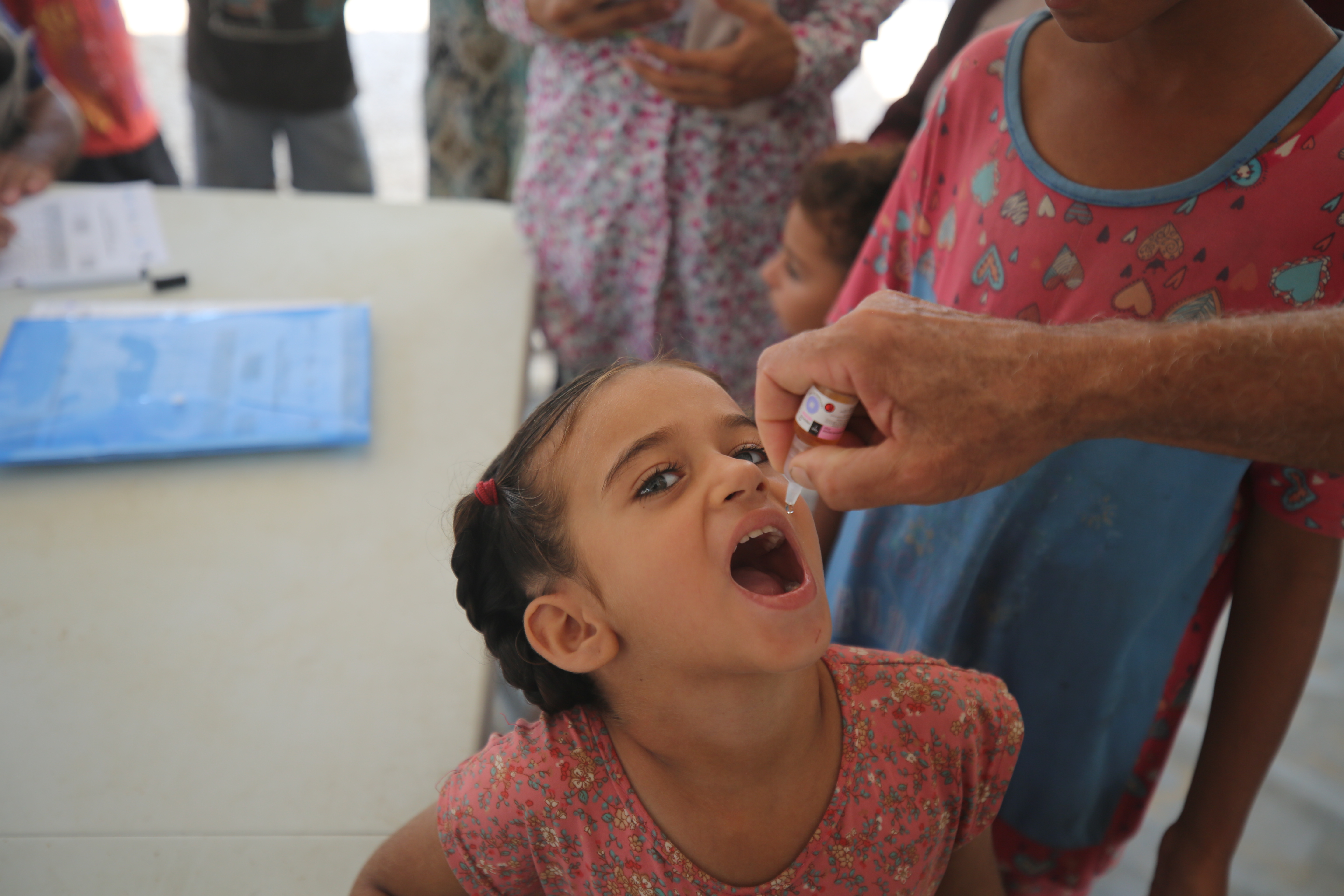 A child receives a vaccination