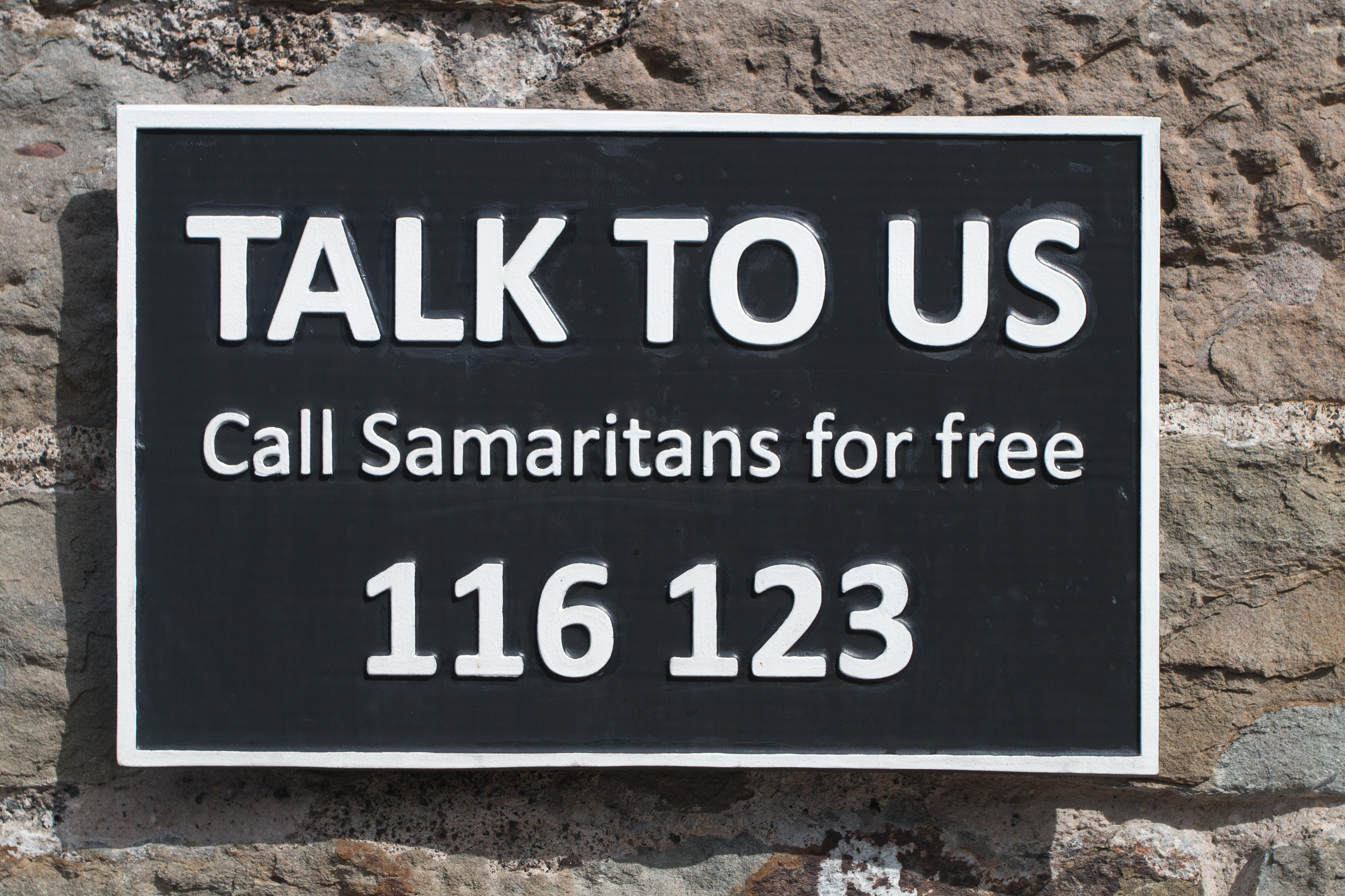 A Samaritans sign with their contact number 116 123