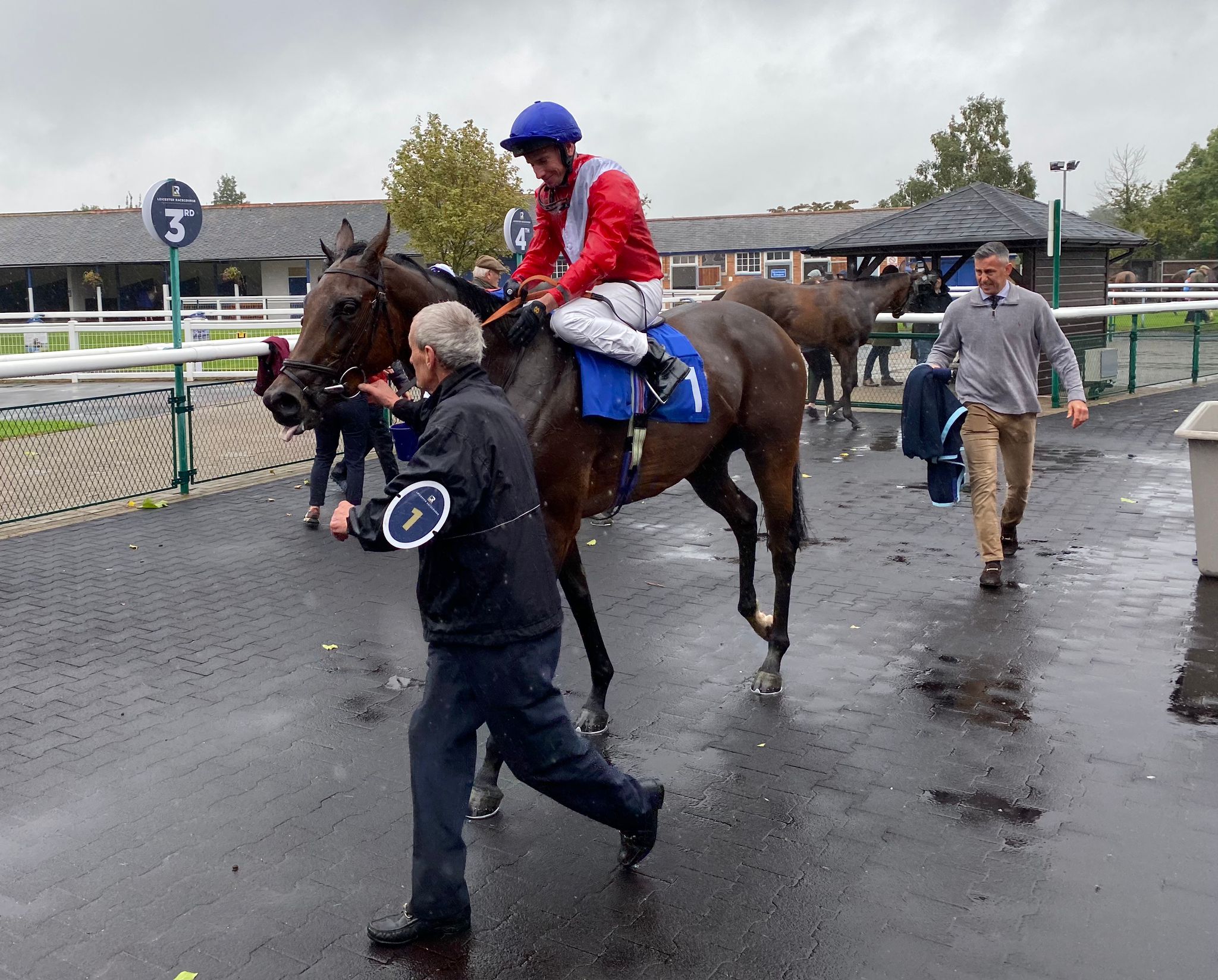 Formal with Ryan Moore in the winner's enclosure at Leicester