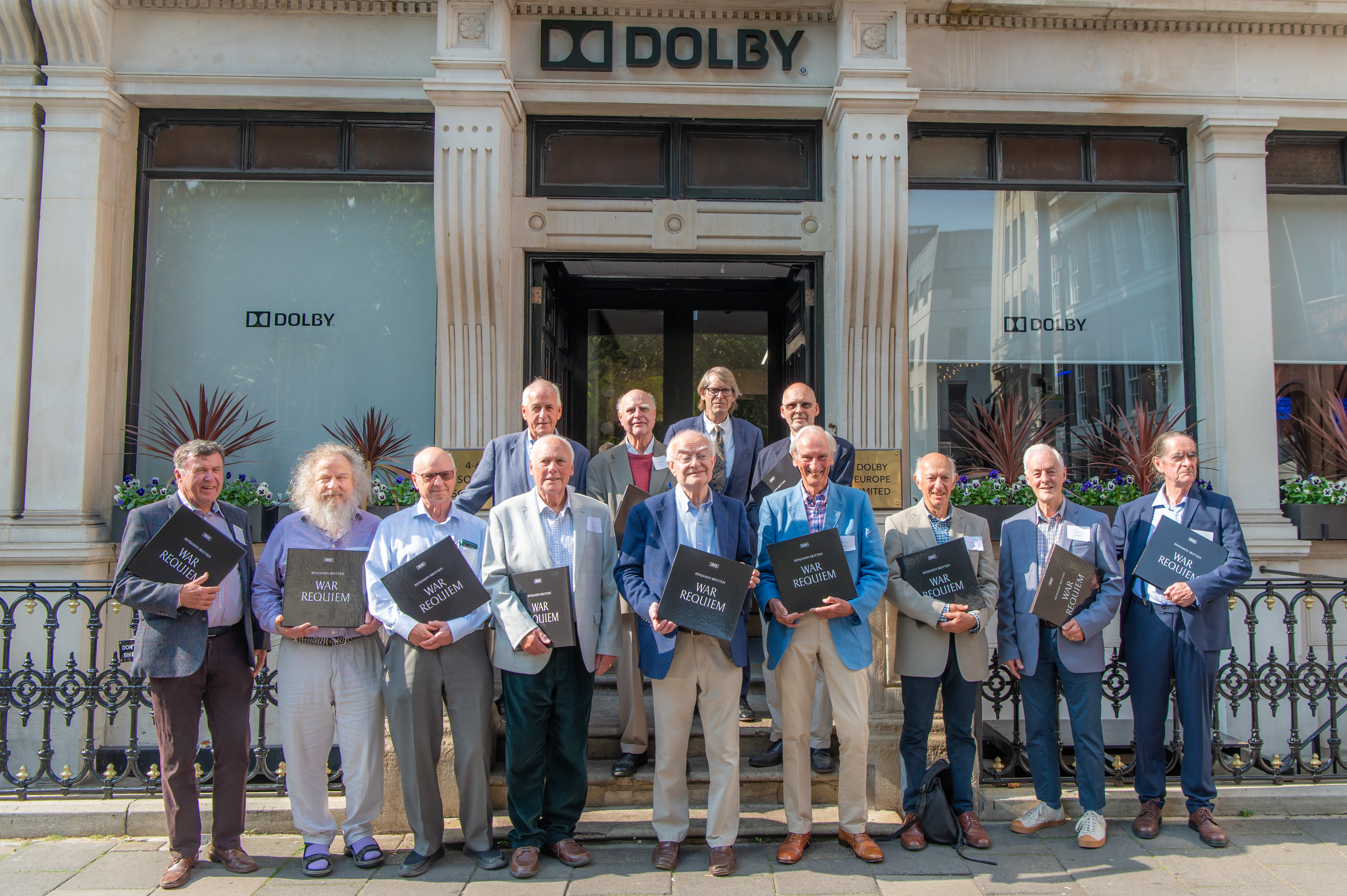 A group of chorister who reunited after recording as school boys in 1093 outside the Dolby Theatre in Soho, London