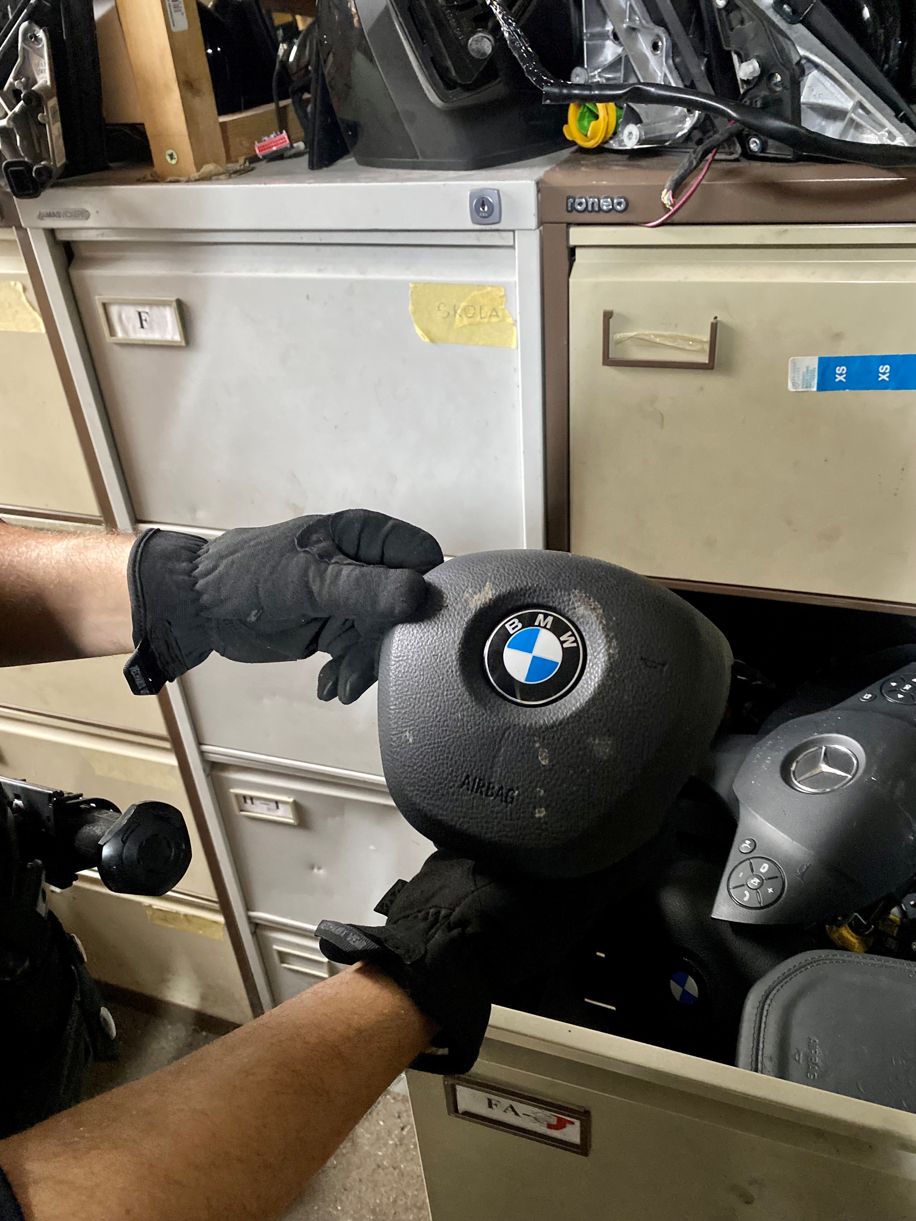 A close up of a fake BMW airbag.