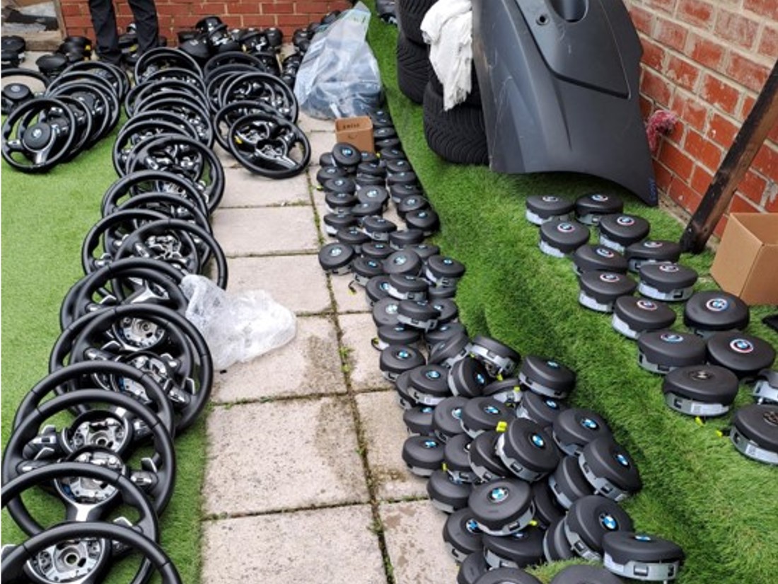 Various steering wheels and airbags that were seized during the raids.