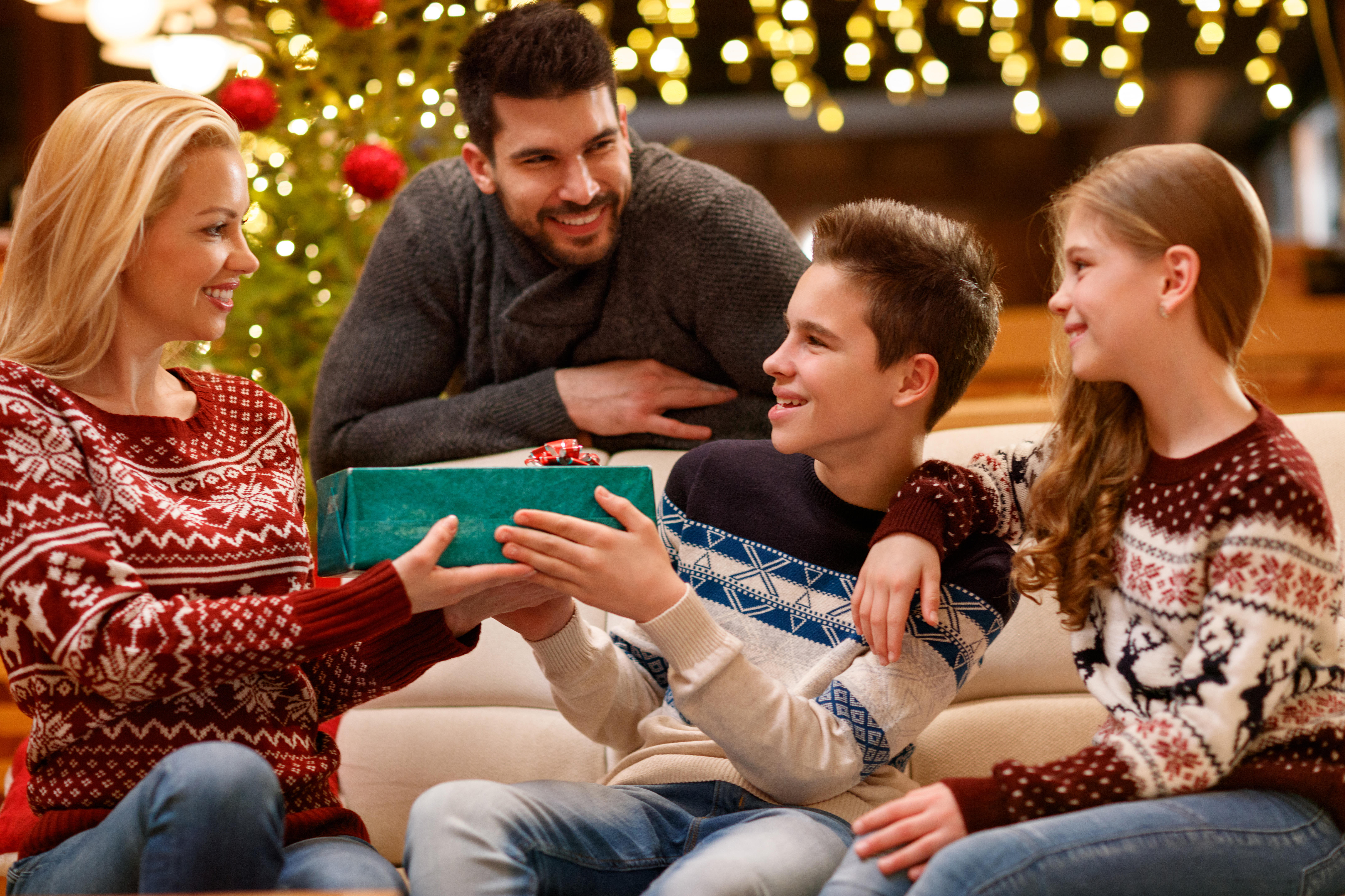 Family opening presents together on Christmas 