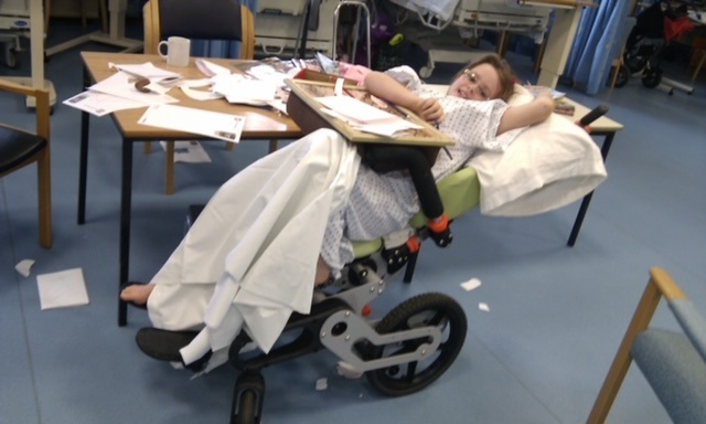 Jamilla Blake after surgery in a special wheelchair 