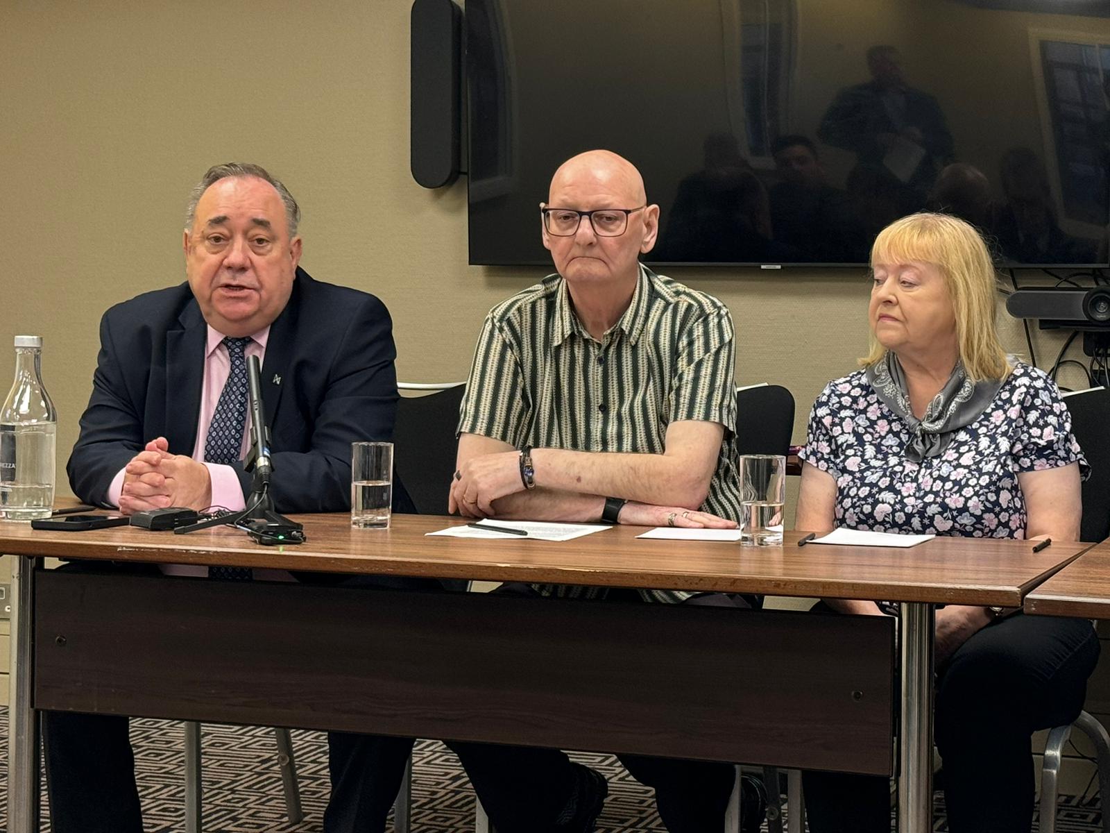 Alex Salmond, Peter and Florence Fanning, sitting at a table