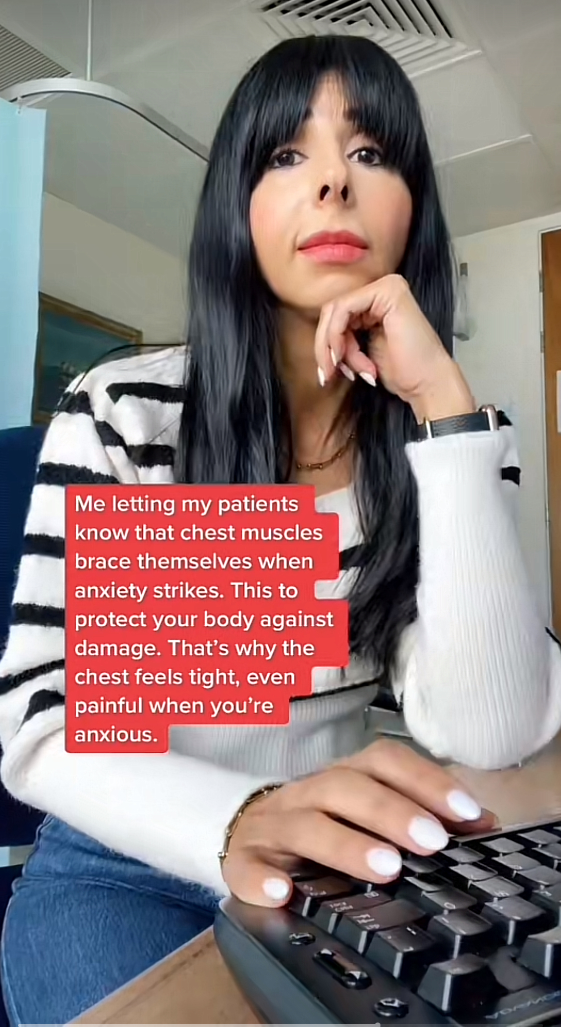 Still from TikTok video of Dr Kirren Schnack in black and white striped top