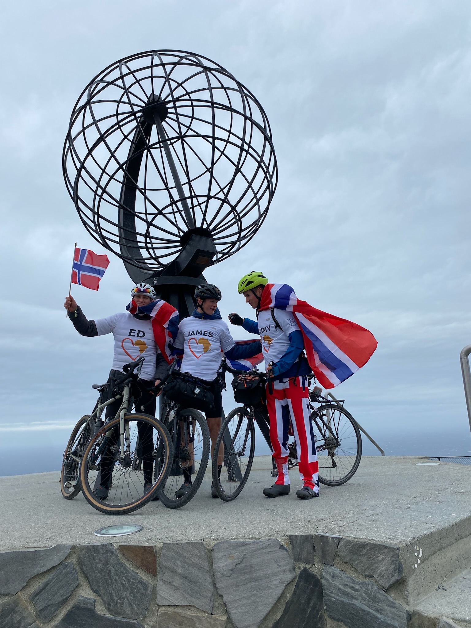 They celebrated after reaching the finishing line in Nordkapp (Ed Watson/University of Bristol/PA)