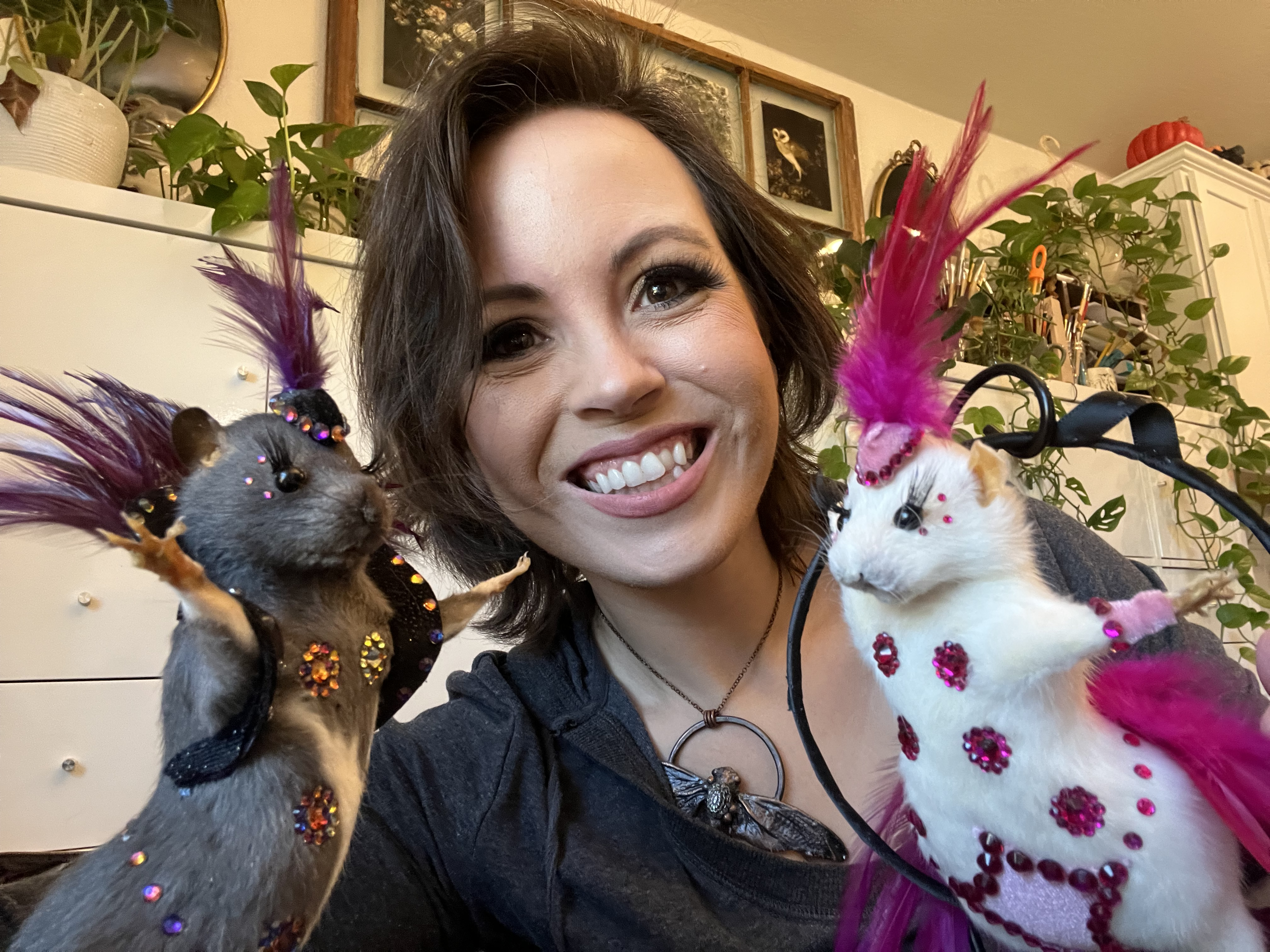 Caitlin Hillis with two of her taxidermy rats