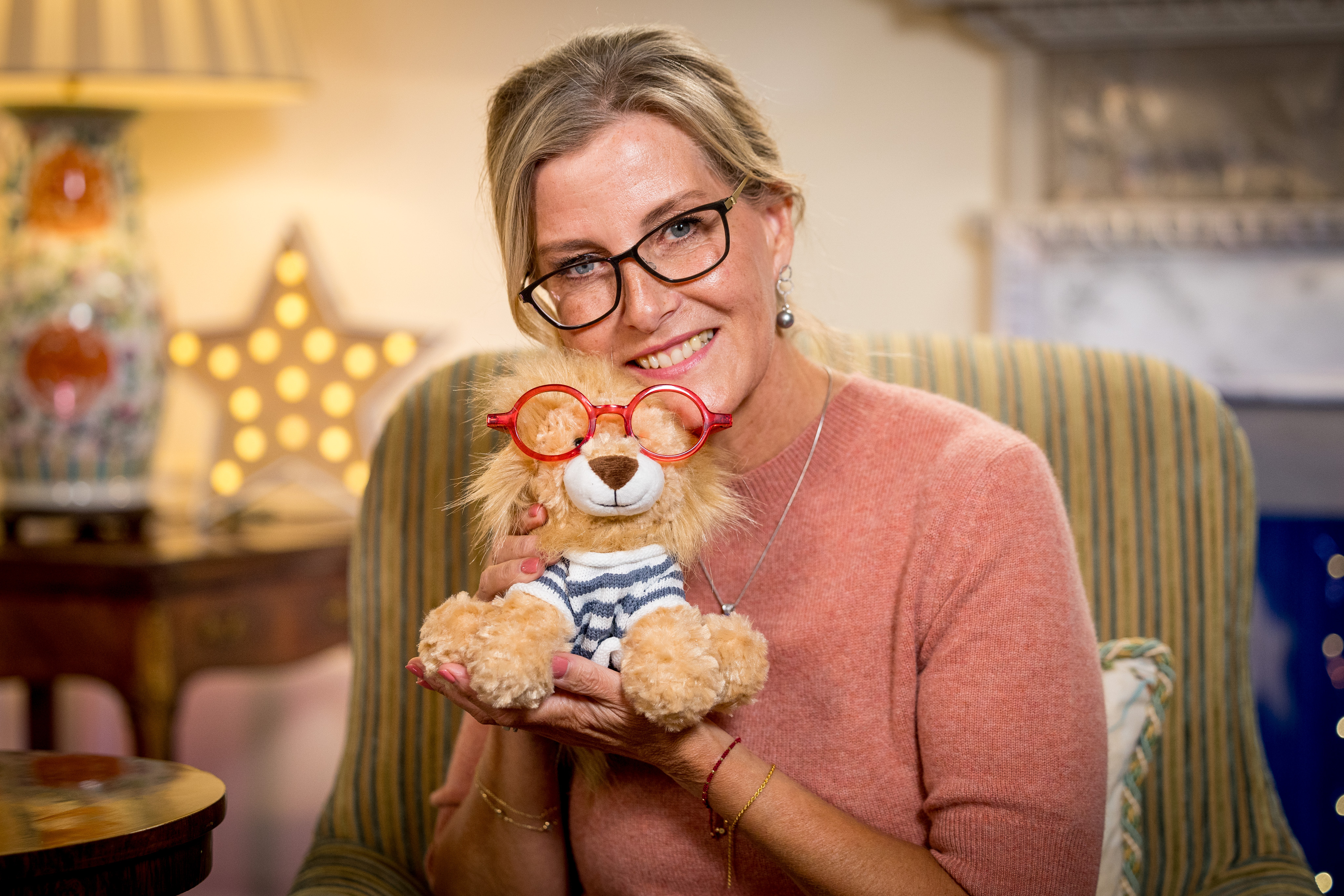 The Duchess of Edinburgh holding a cuddly dog toy