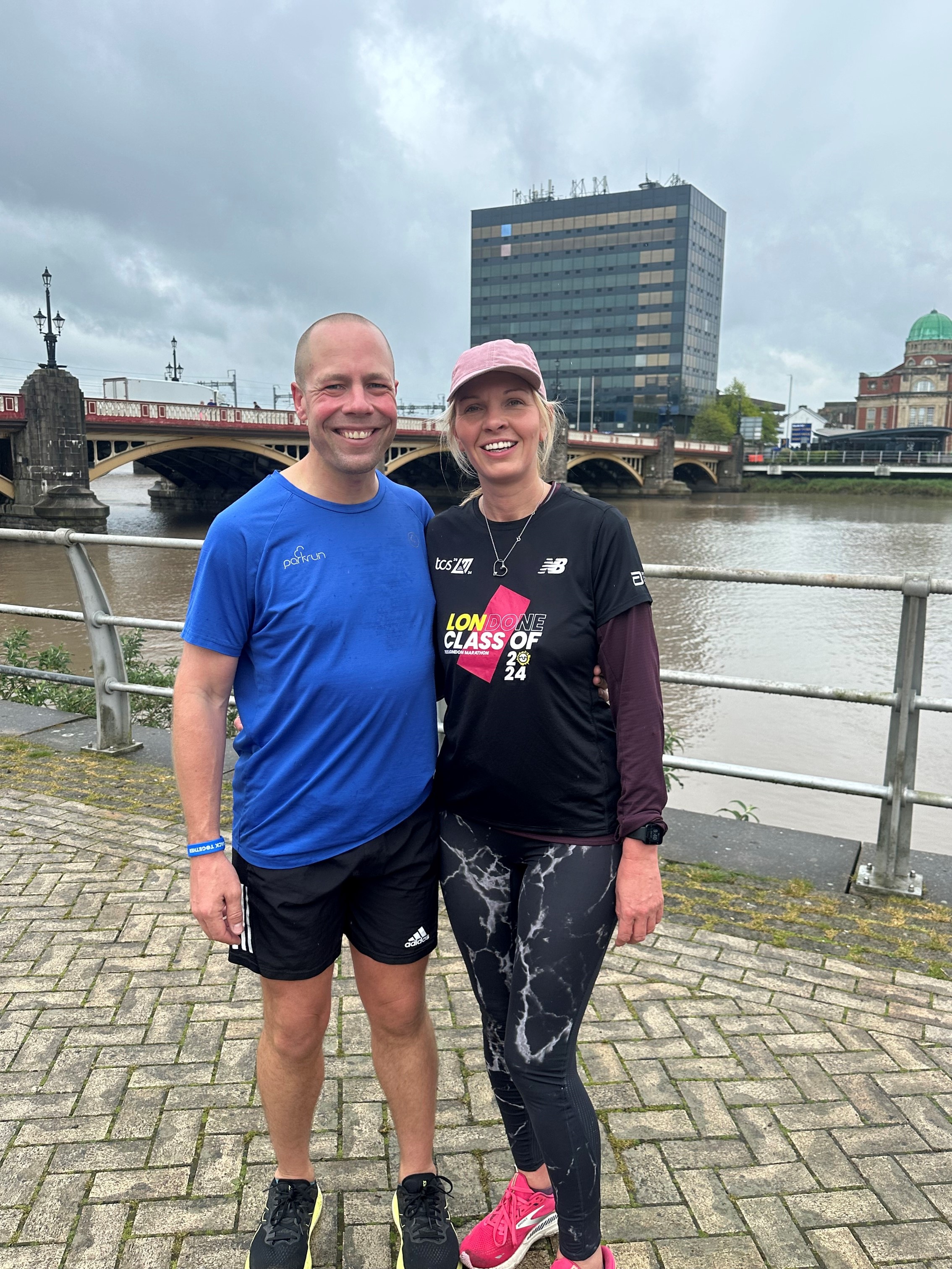 Darren Wood with his partner Kellyjo Tapsell by the river in Newport