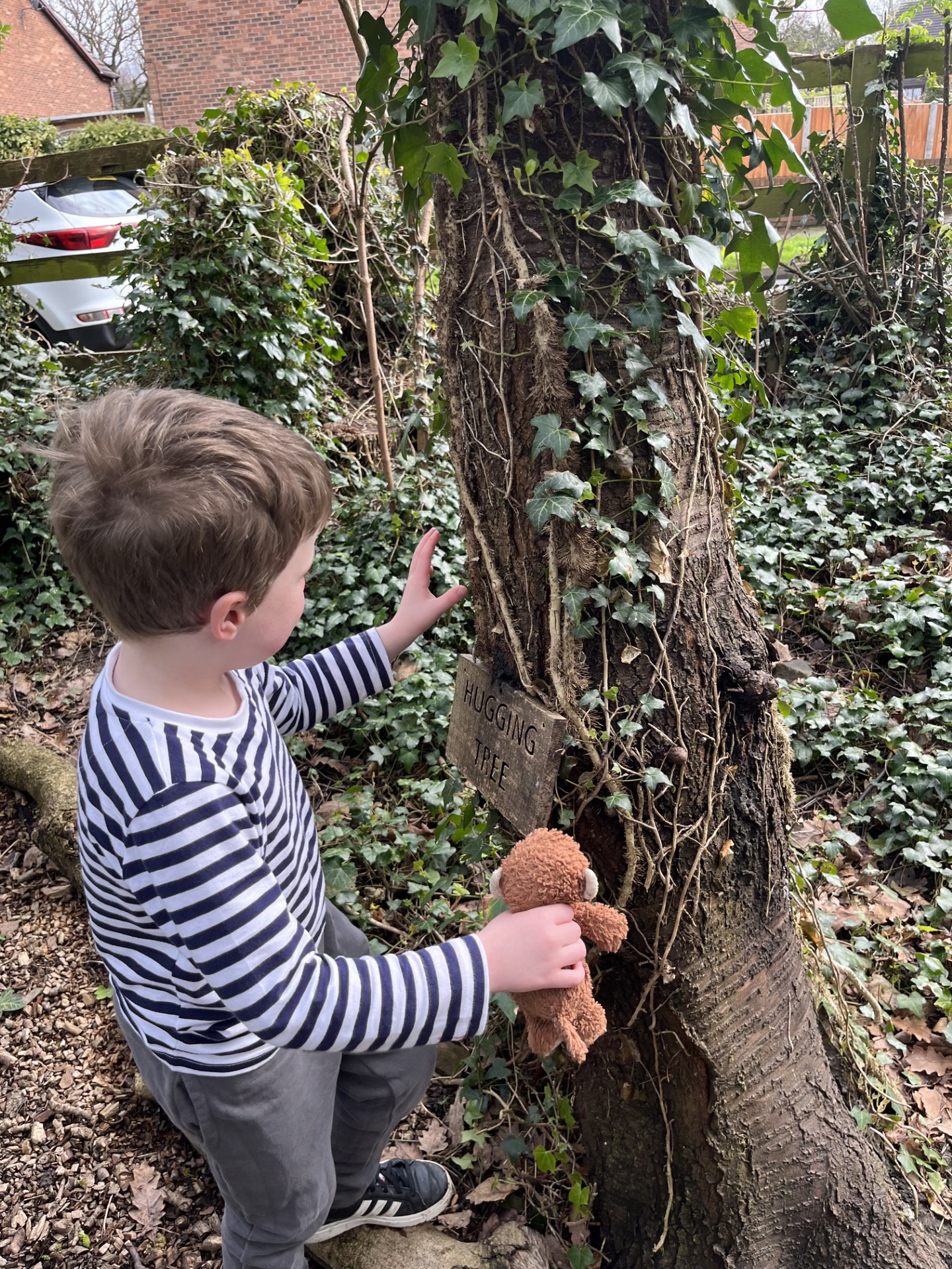 Boy holding toy in hand 