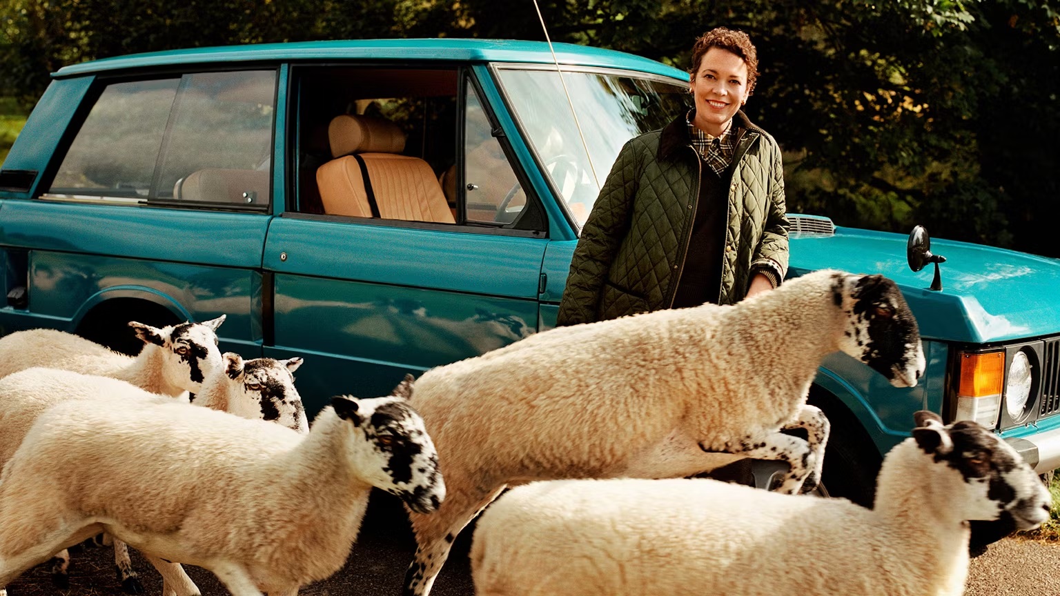 The Crown's Olivia Coleman poses in an olive quilted jacket