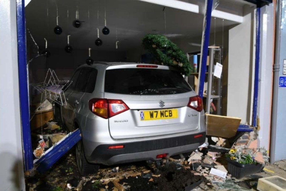 Car crashed into an office