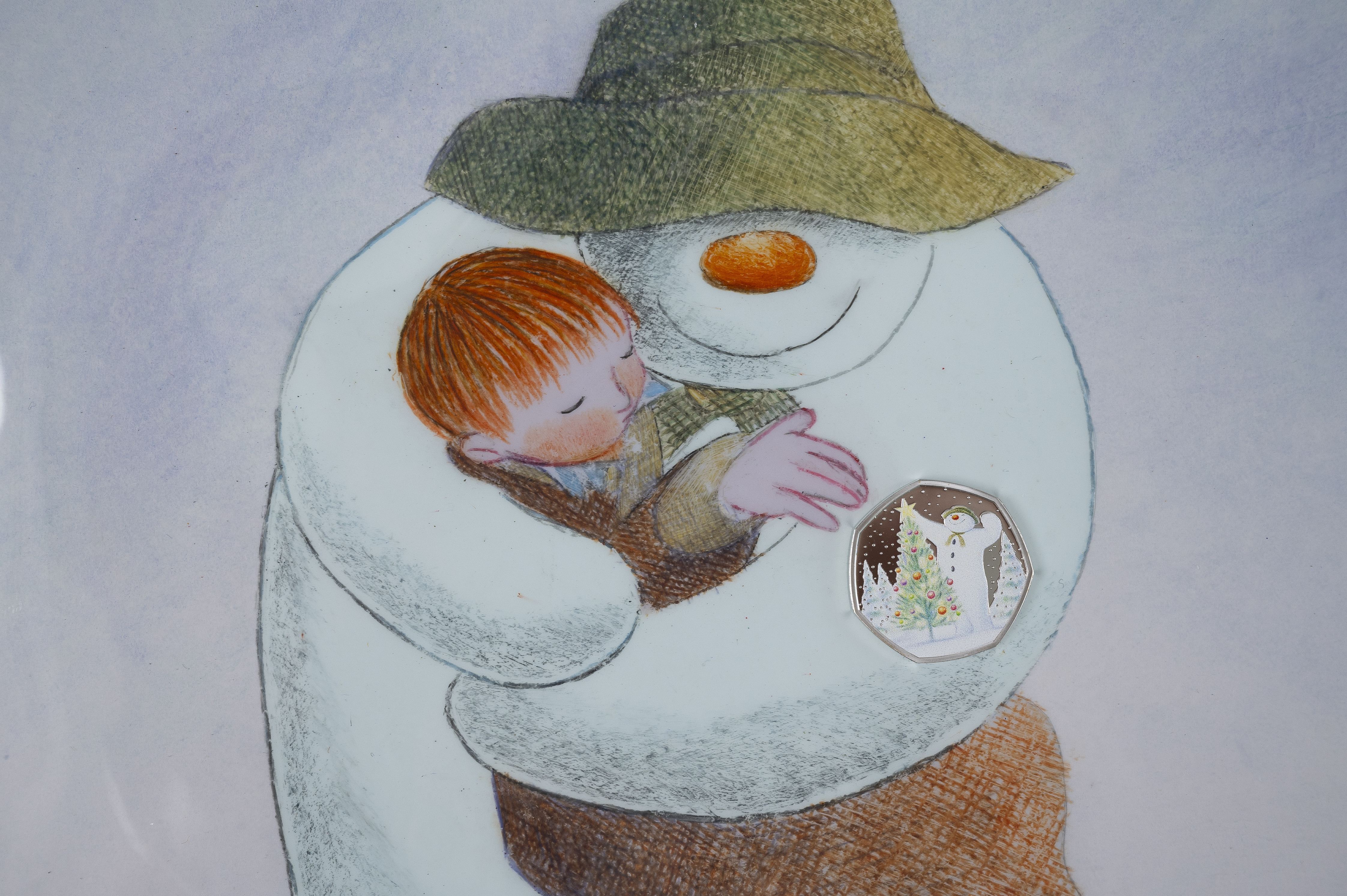 The Snowman illustration and coin