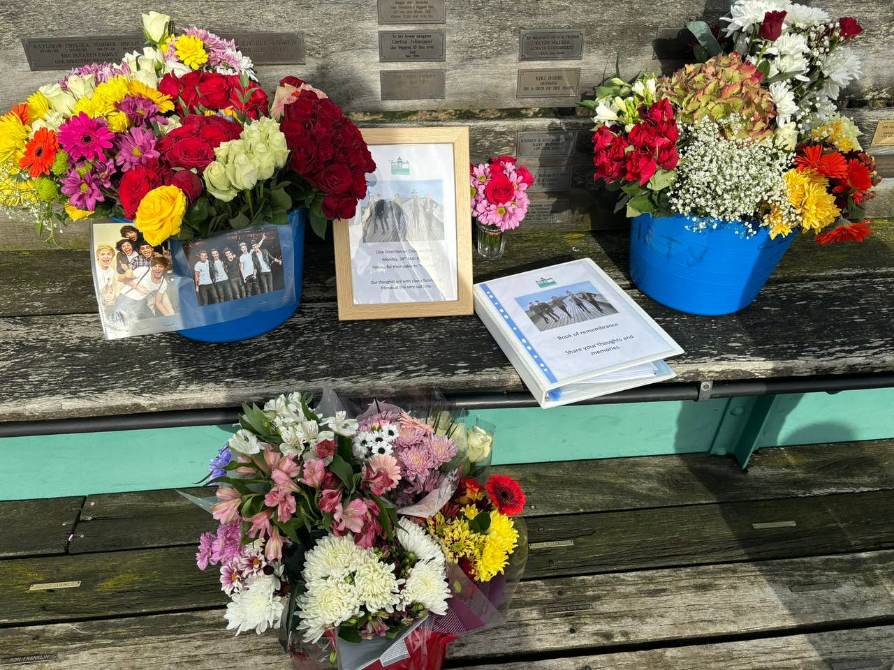 One Direction fans leave flowers on Somerset pier for Liam Payne