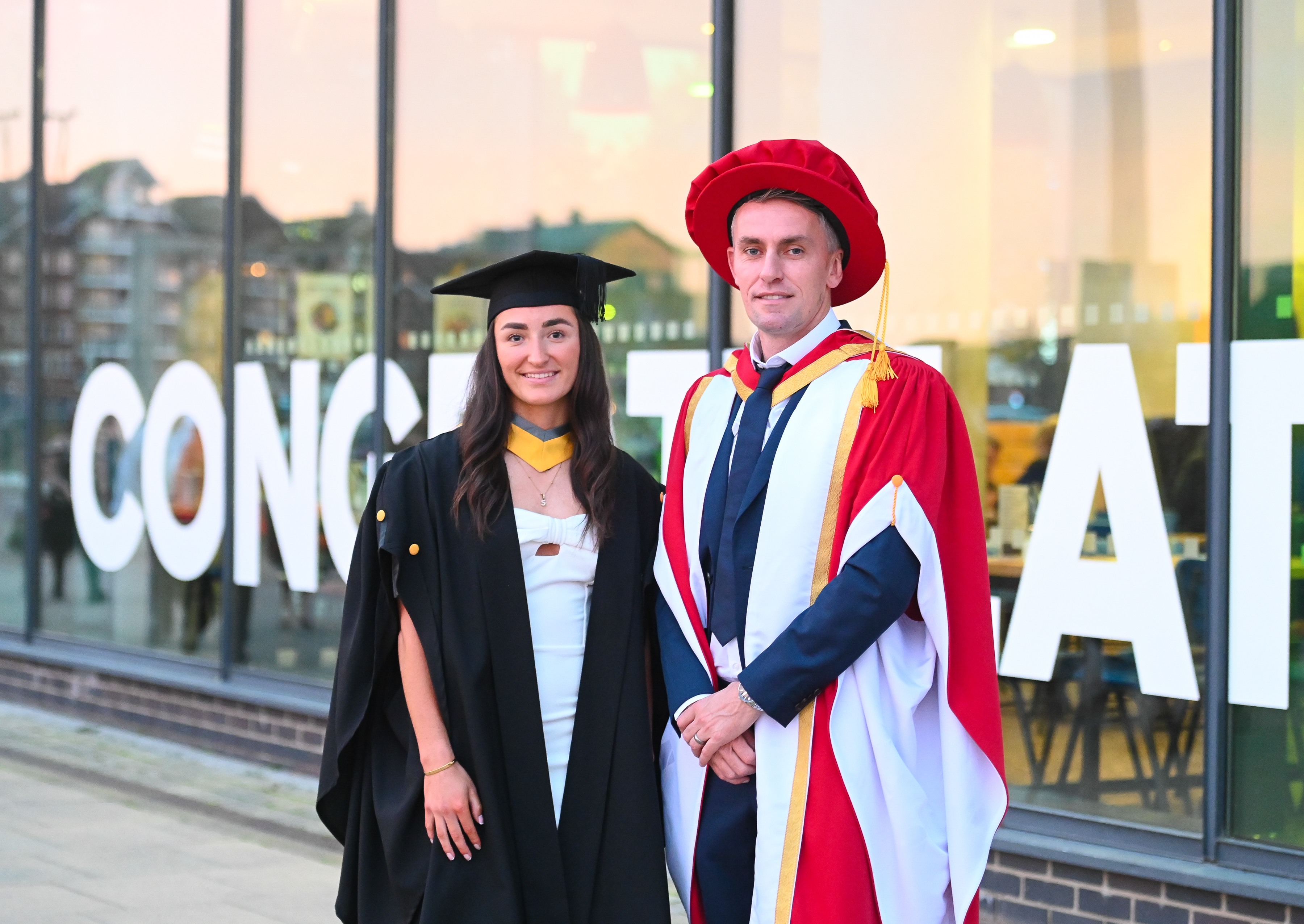 Ipswich Town manager Kieran McKenna alongside Sophie Peskett, 21, who is Ipswich Town’s only professional female player and has graduated with a first-class degree. (University of Suffolk/ Gregg Brown Photography/ PA)