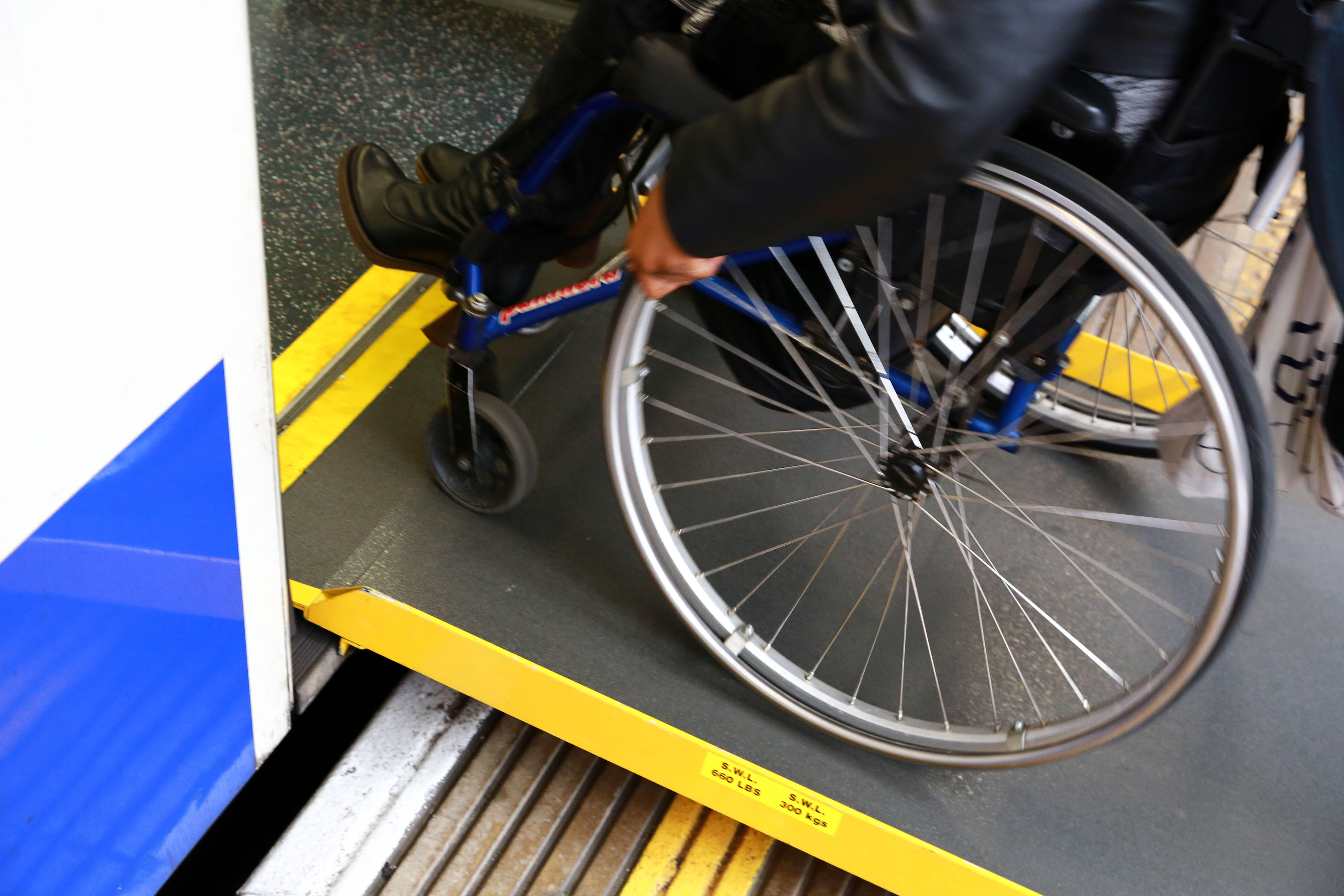 Close-up of a wheelchair on access ramp