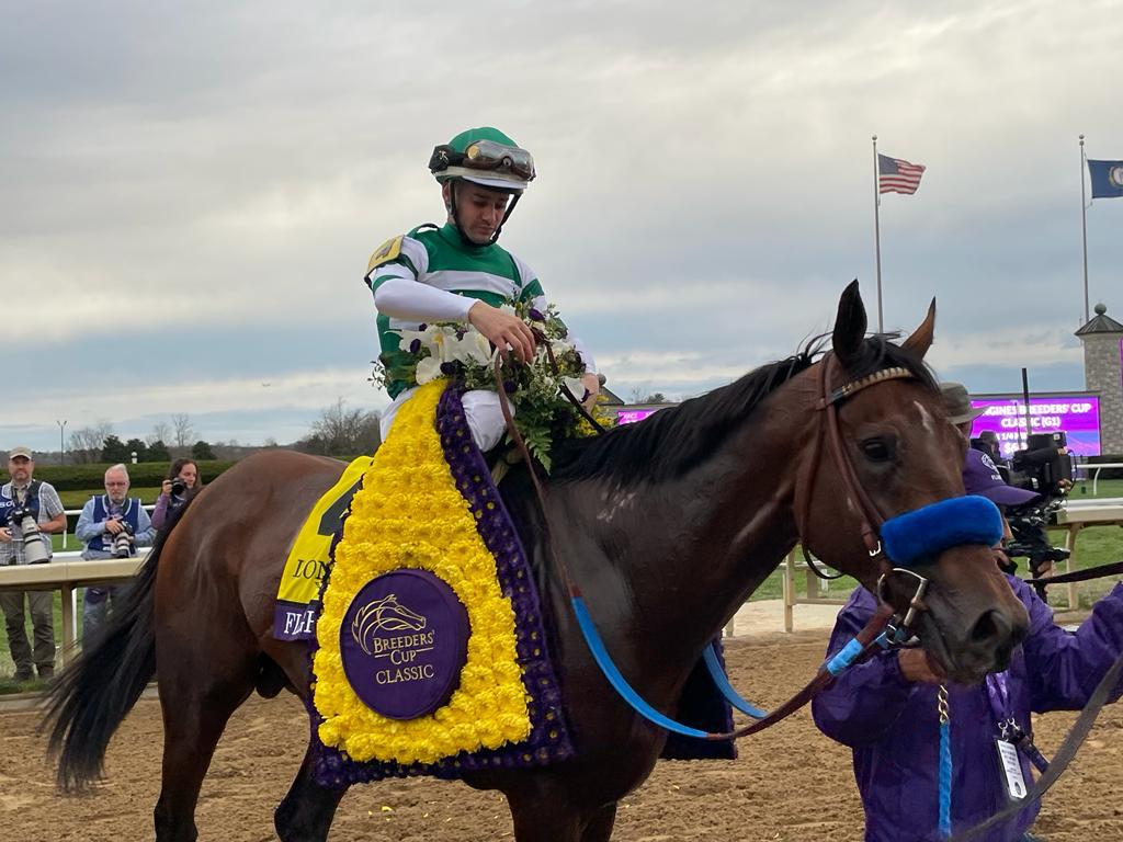 Flavien Prat with Flightline after the Breeders' Cup Classic 