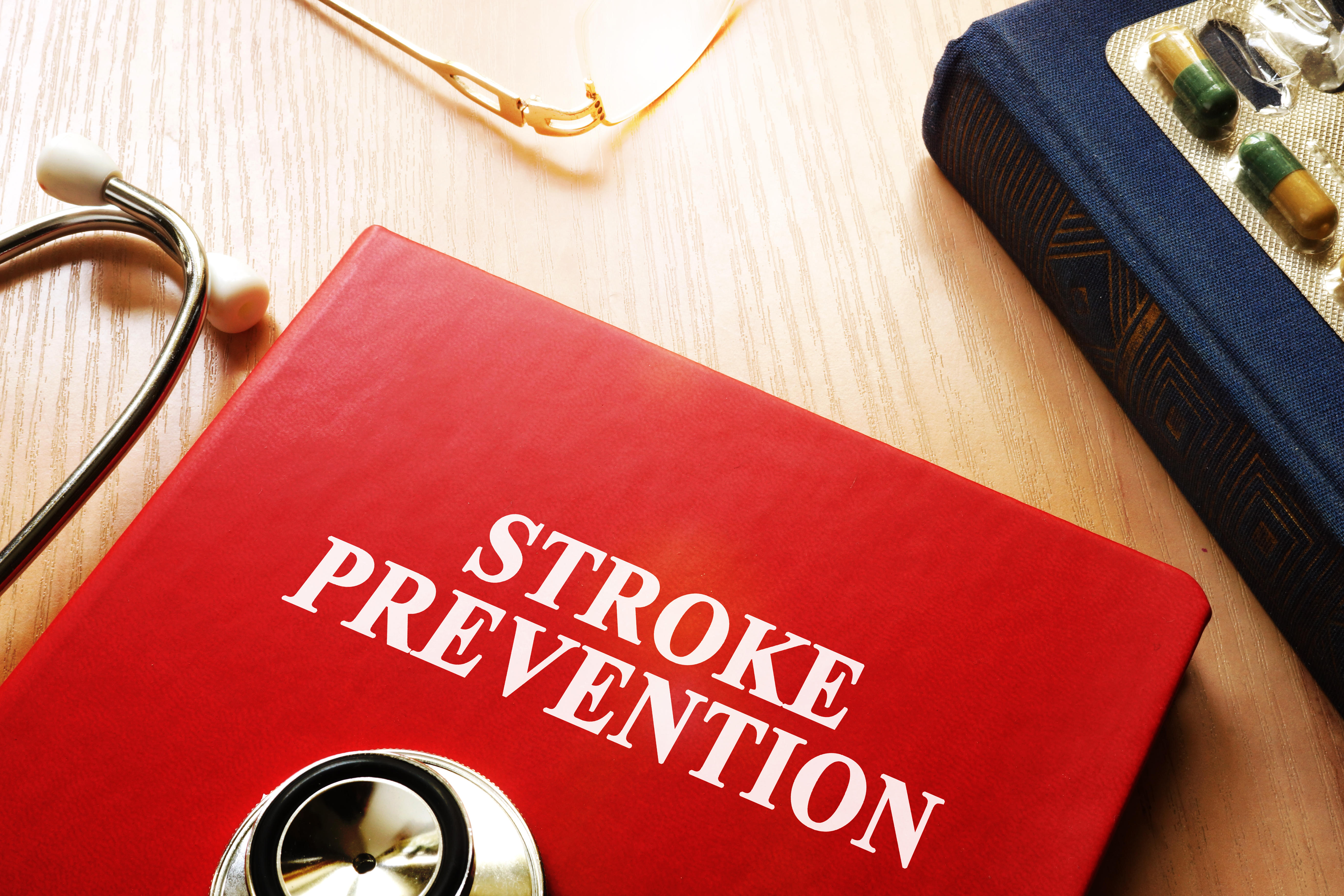 Stroke Prevention written on a red book cover