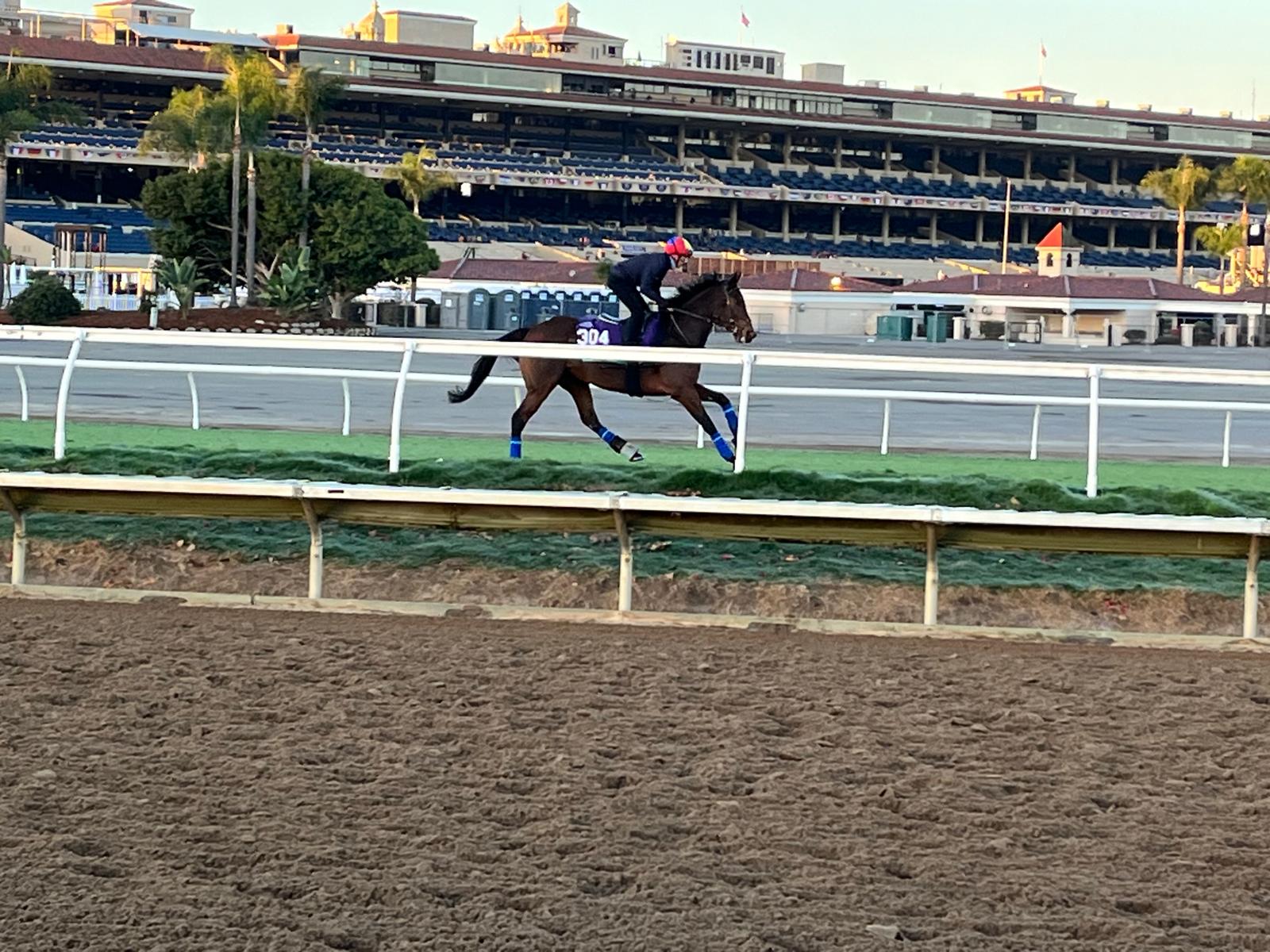 Emily Upjohn cantering under Frankie Dettori