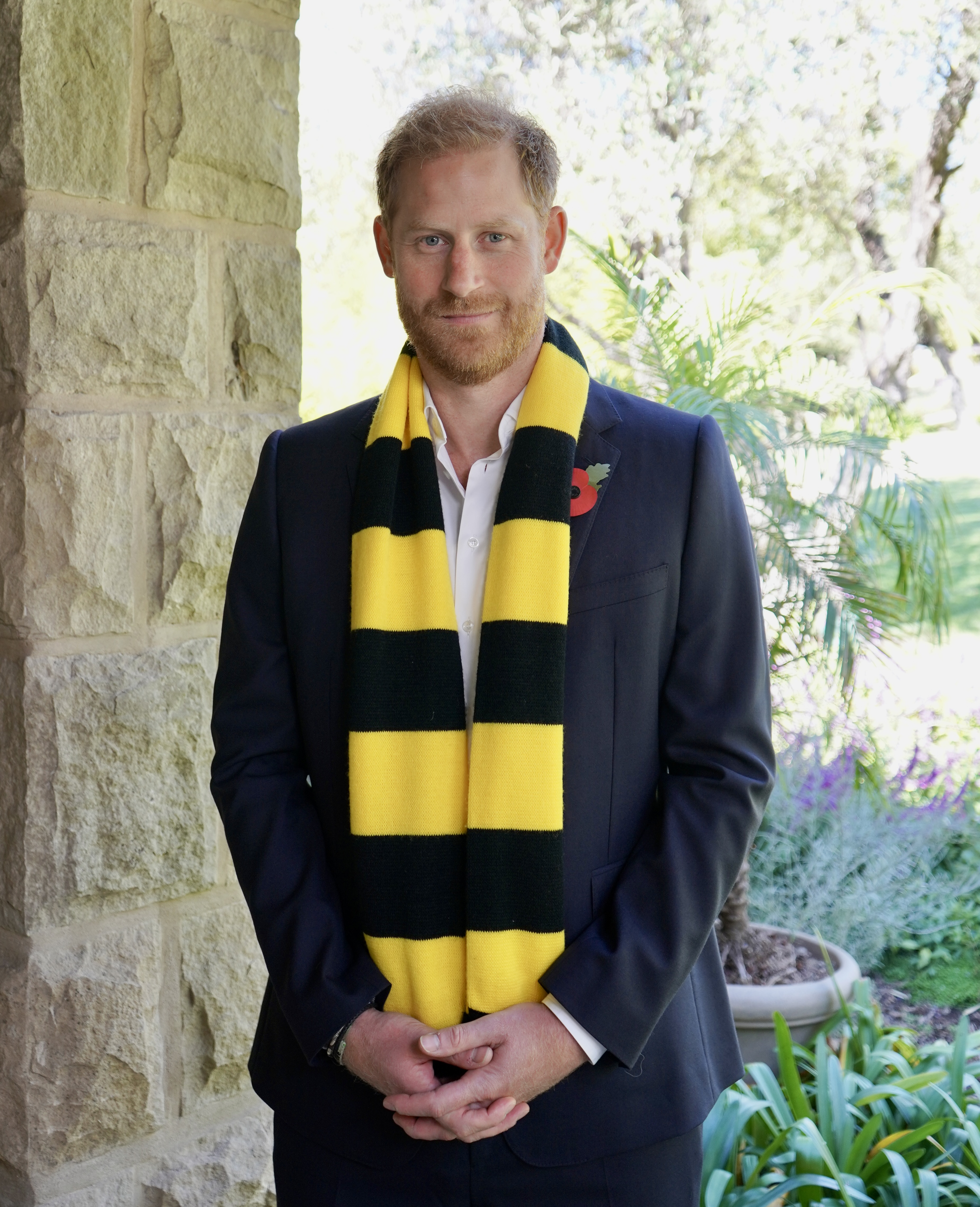 The Duke of Sussex wearing a Scotty's Little Soldiers scarf (Archewell/PA)