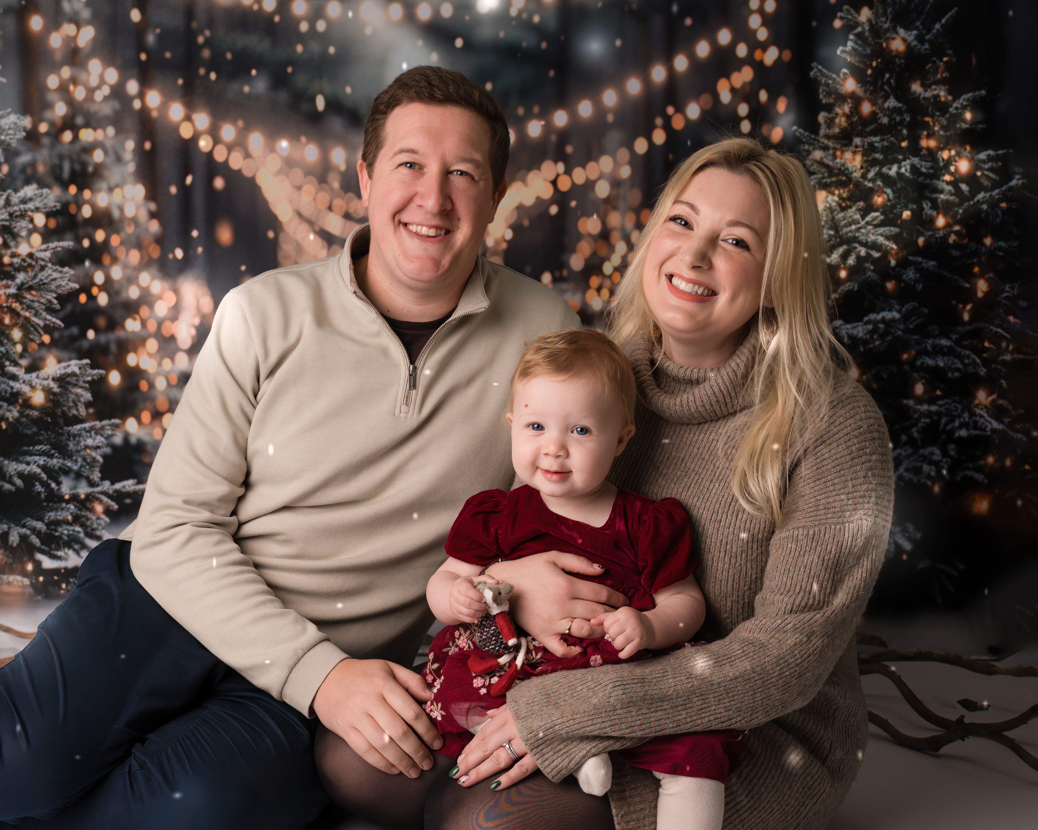 Aurora with her parents Sam and Laura Hudson