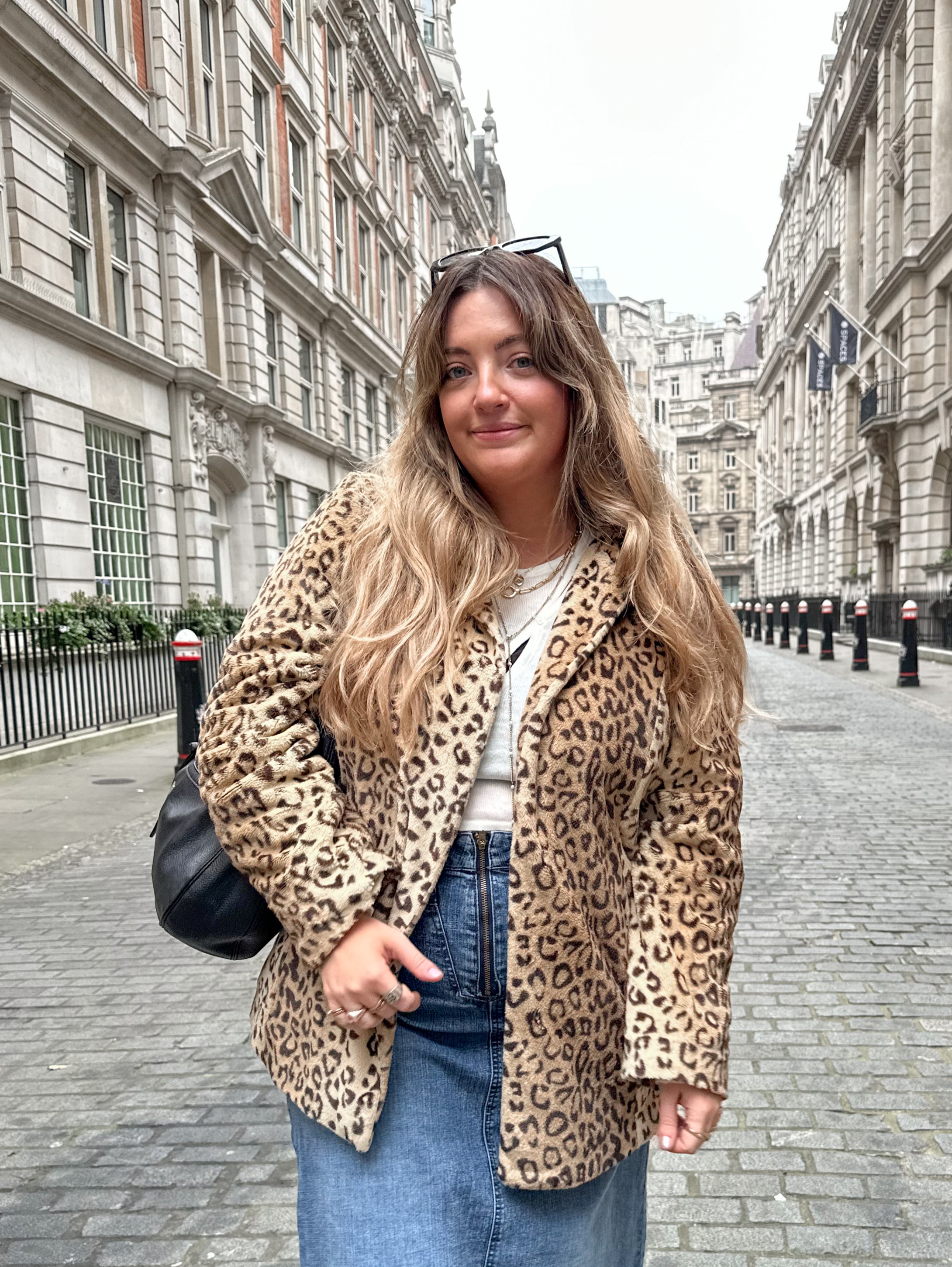 Hannah Weet wearing a second hand leopard print jacket