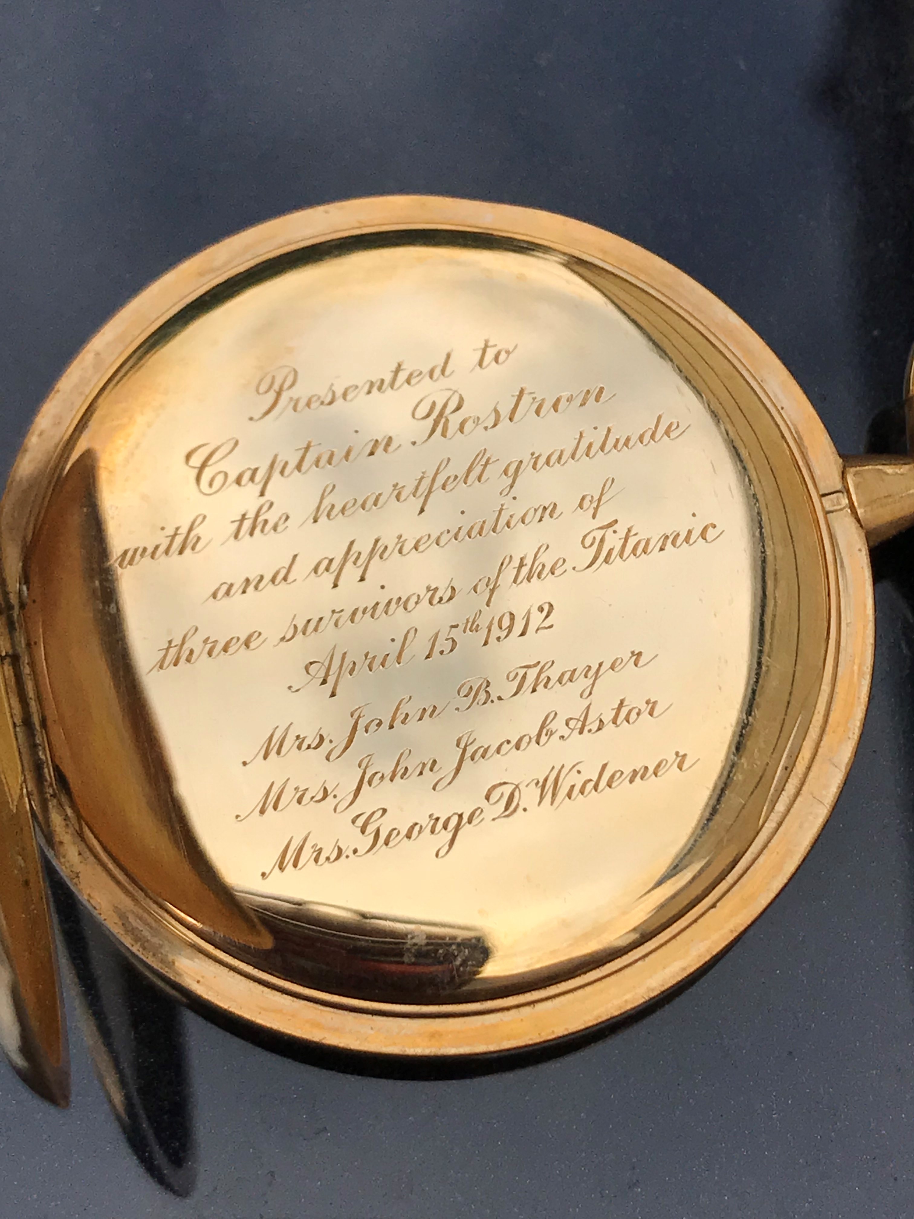 An inscribed gold pocket watch