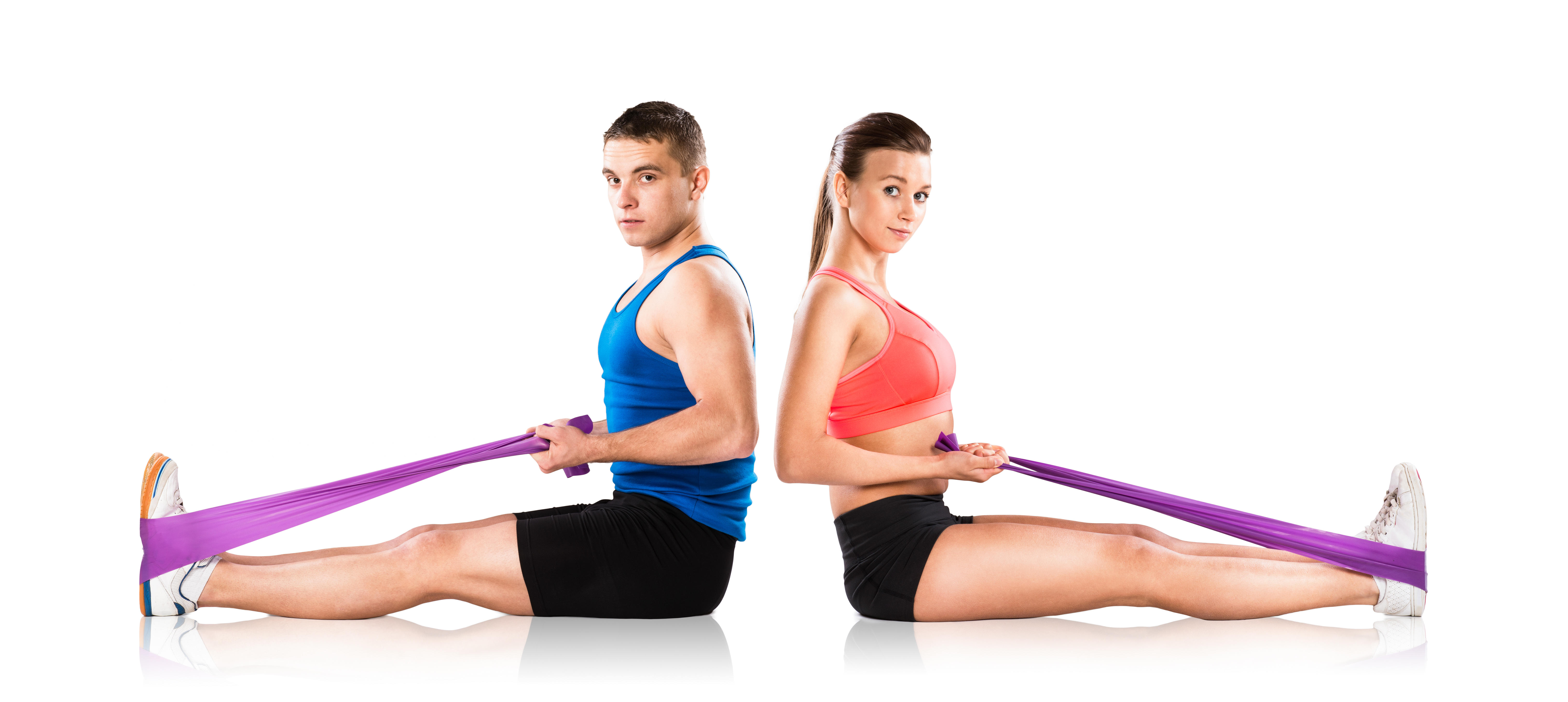 Young athlete doing exercises with a resistance band