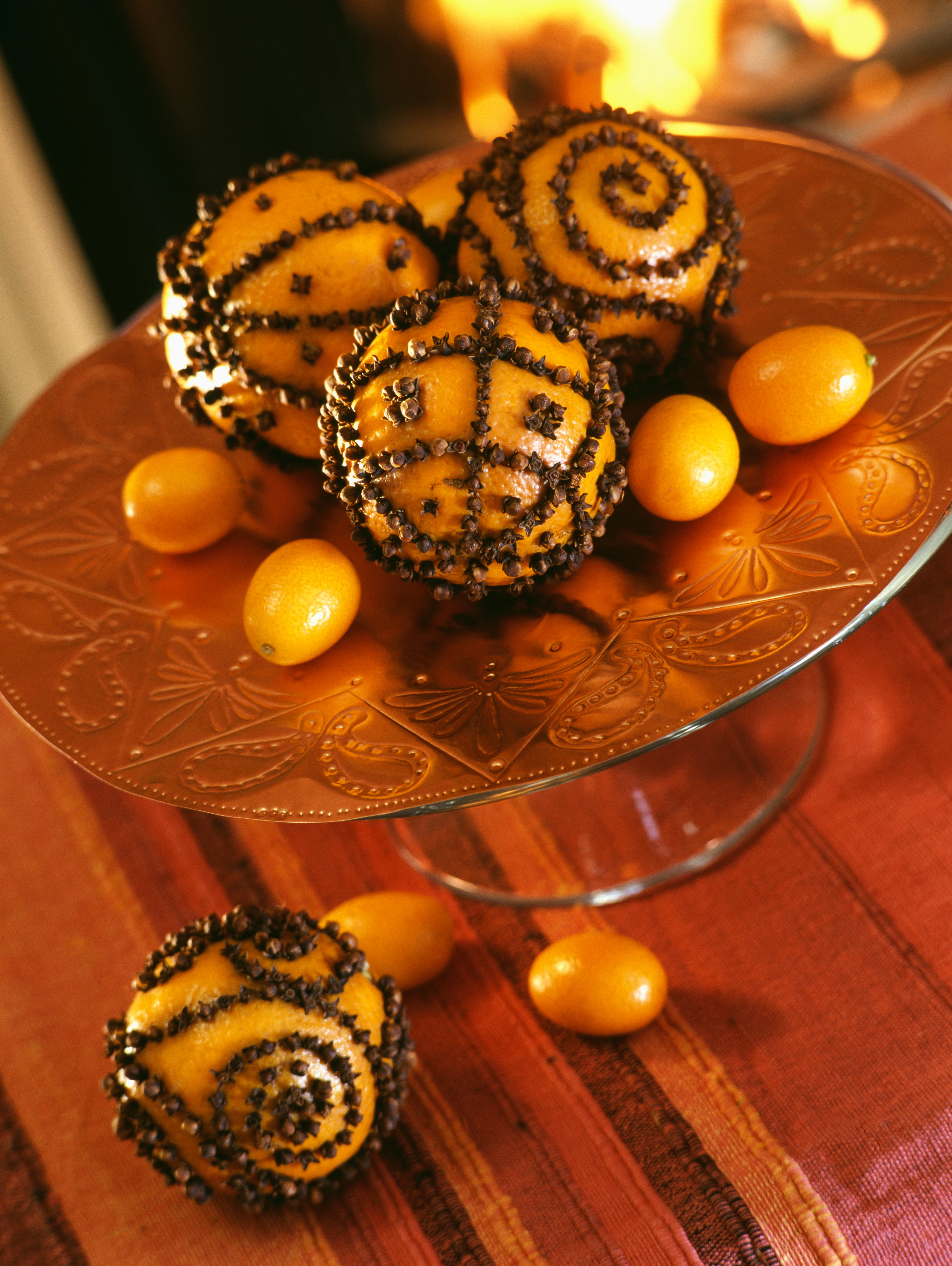 Festive pomanders made from clove-studded oranges (Alamy/PA)