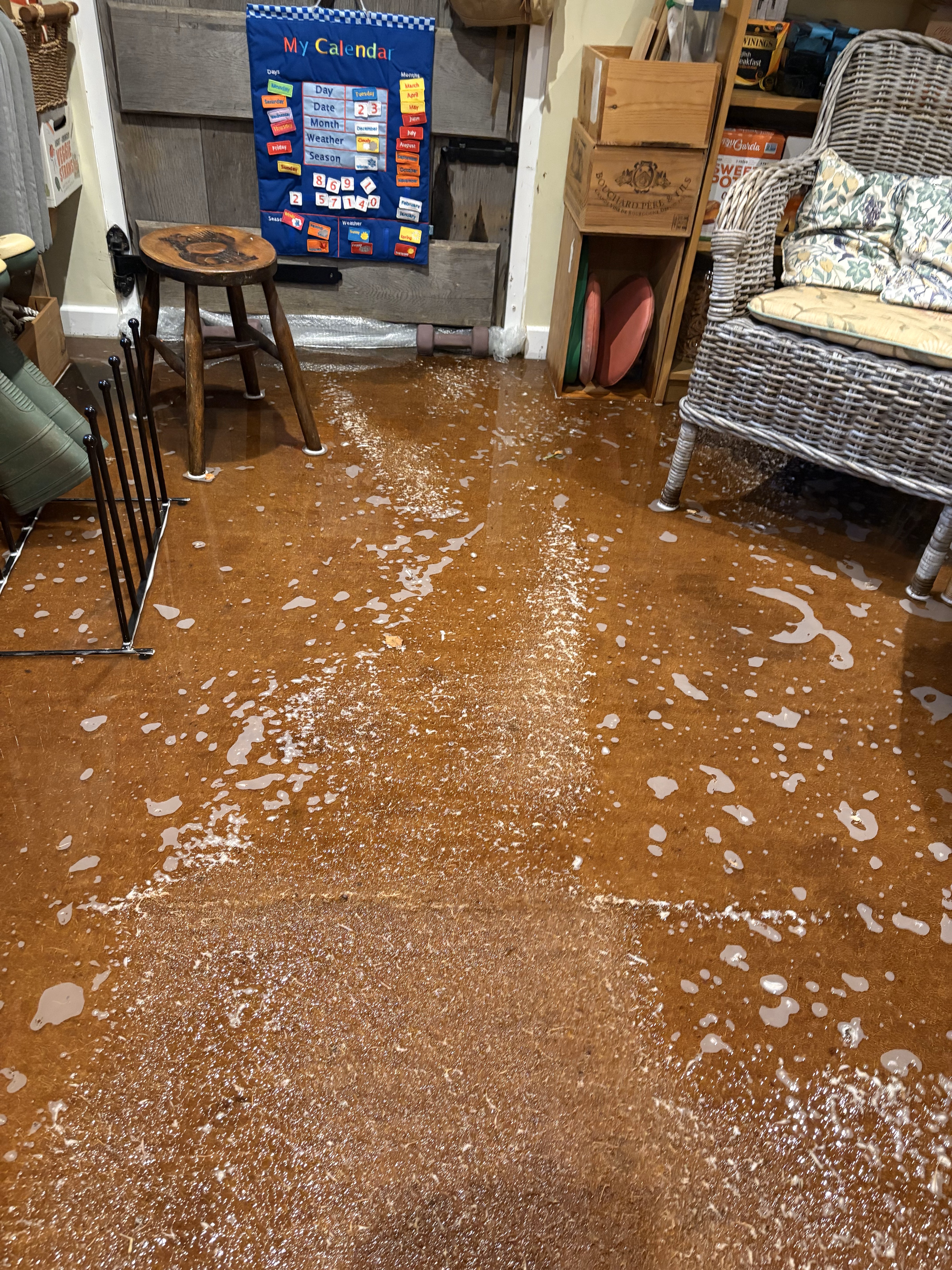 An image showing a room in the home of Christine Hamilton following flooding from Storm Bert