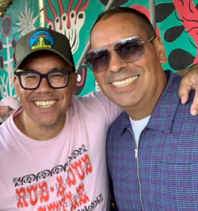 Ashley Beedle smiling with his fellow Black Science Orchestra member Rob Mello